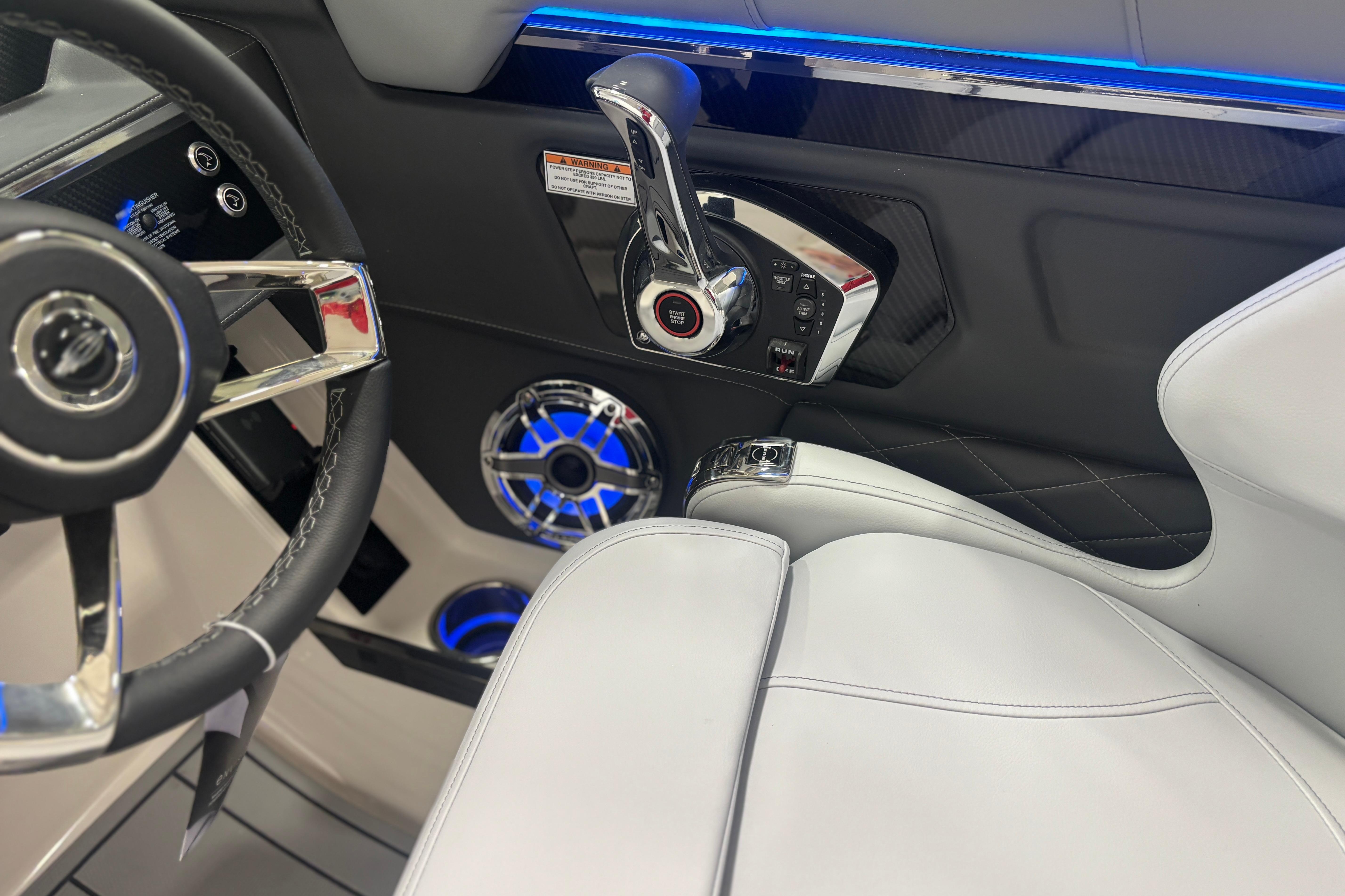 Interior of 2026 Chaparral SSX 30 boat featuring steering wheel and control panel.