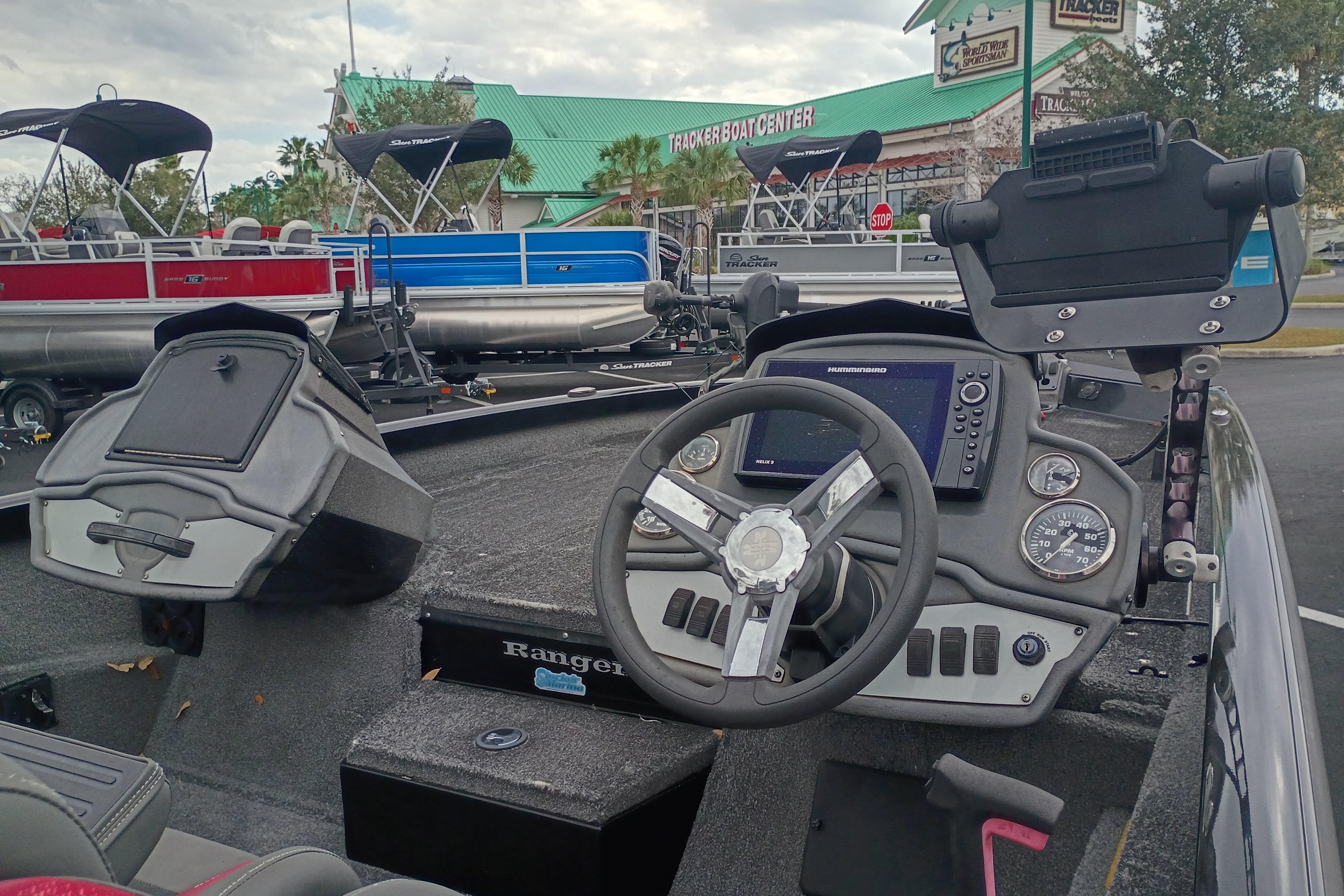 2021 Ranger RT198P boat dashboard with steering wheel and navigation system.
