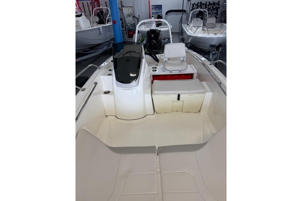 2026 Boston Whaler 160 Super Sport interior view, showcasing seating and console.
