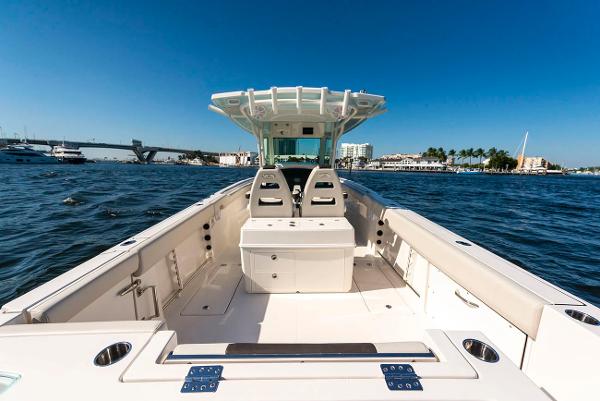 Manufacturer Provided Image: 2026 Sailfish 312 CC boat on open water, featuring spacious deck and modern design.