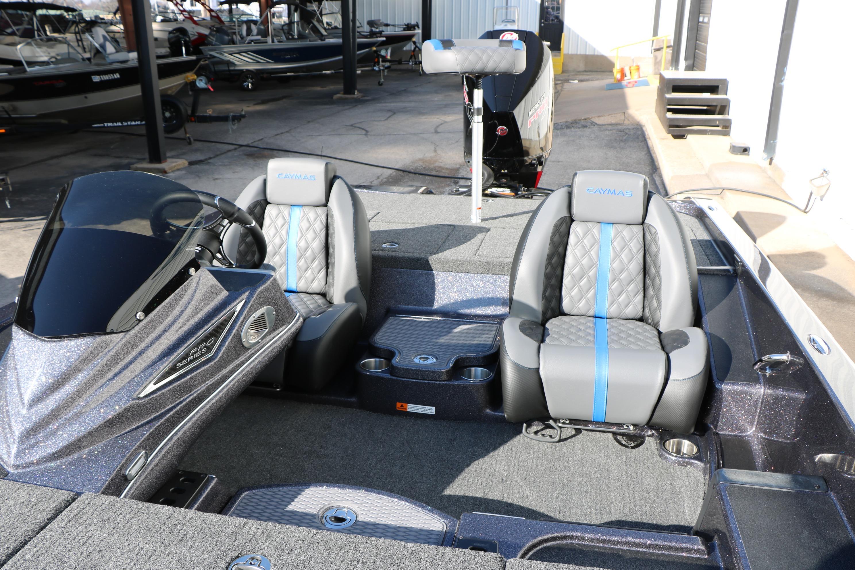2027 Caymas 201 Pro boat interior with dual seats and modern dashboard design.