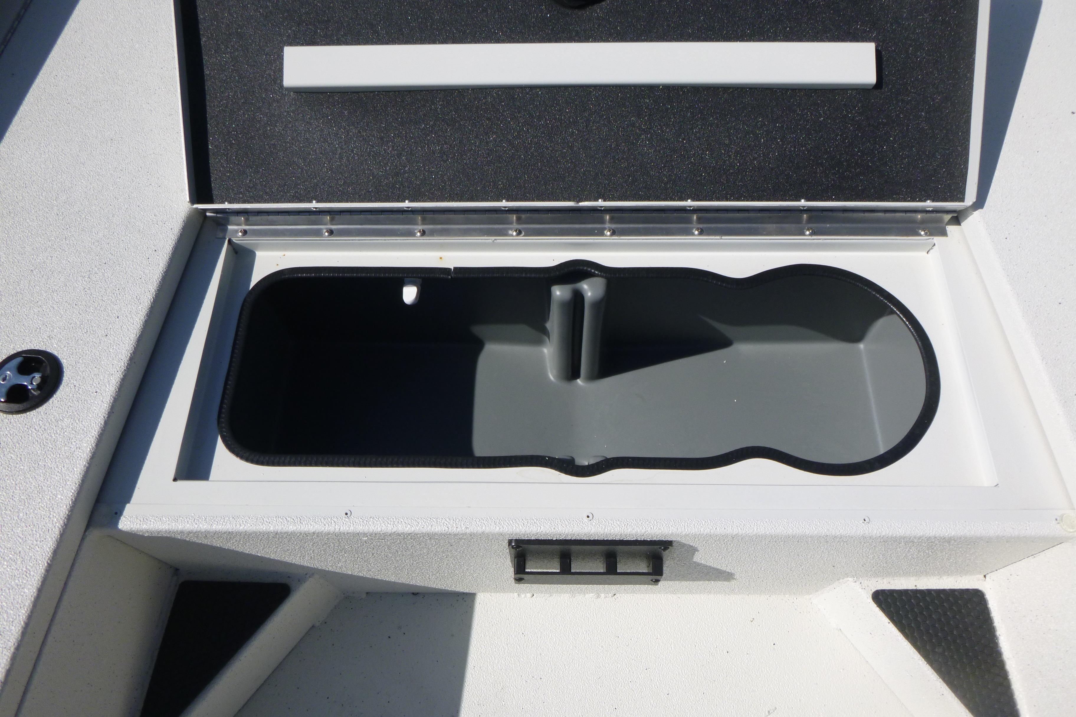 Open storage compartment in 2025 Ranger RB210 boat.
