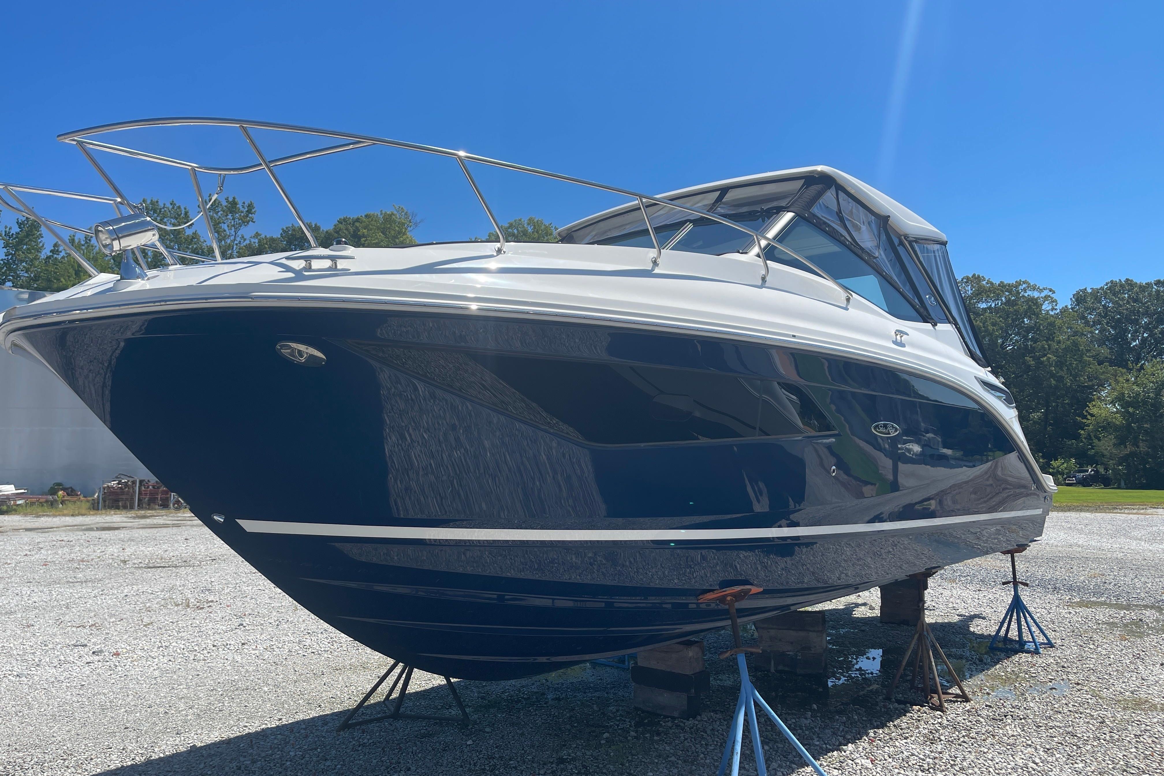 2023 Sea Ray Sundancer 320 Outboard on a dry dock.