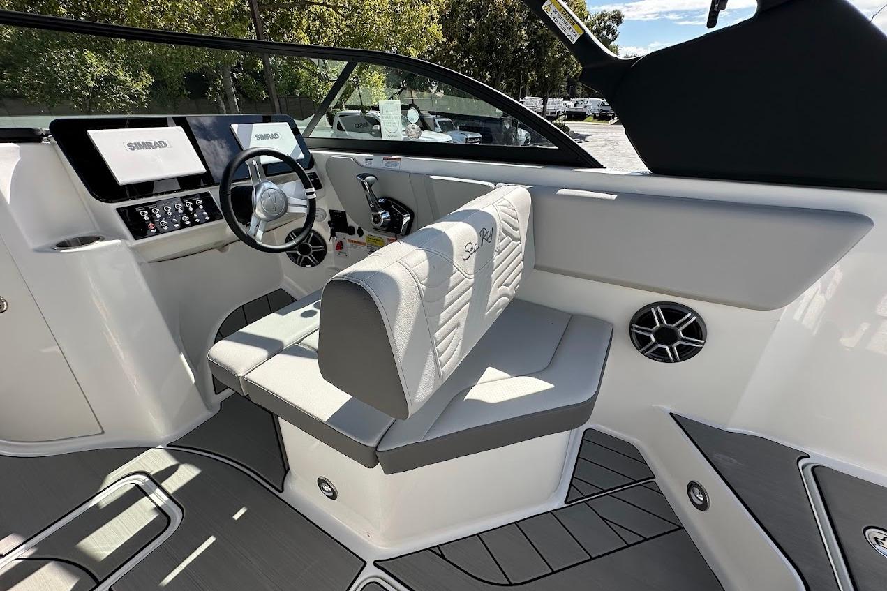 2026 Sea Ray SDX 230 Surf boat interior with modern dashboard and seating.
