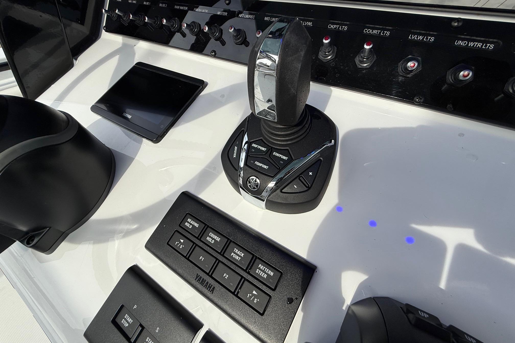 Control panel of 2026 Sea Hunt Gamefish 30 Coffin Box with Yamaha joystick and switches.