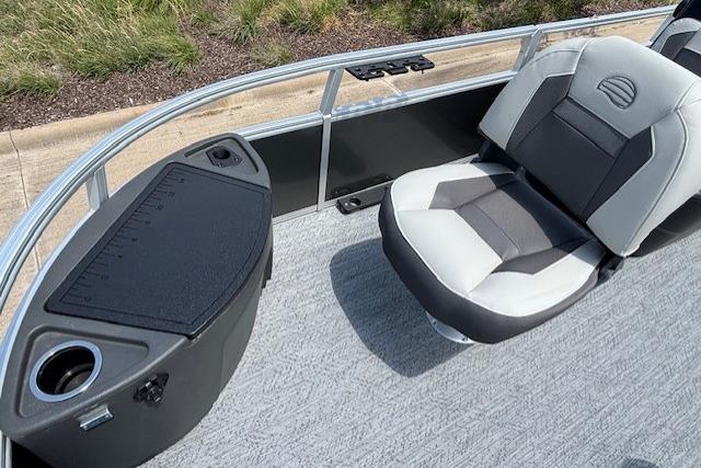 2026 Sun Tracker Bass Buggy 18 DLX boat interior with seating and storage compartment.