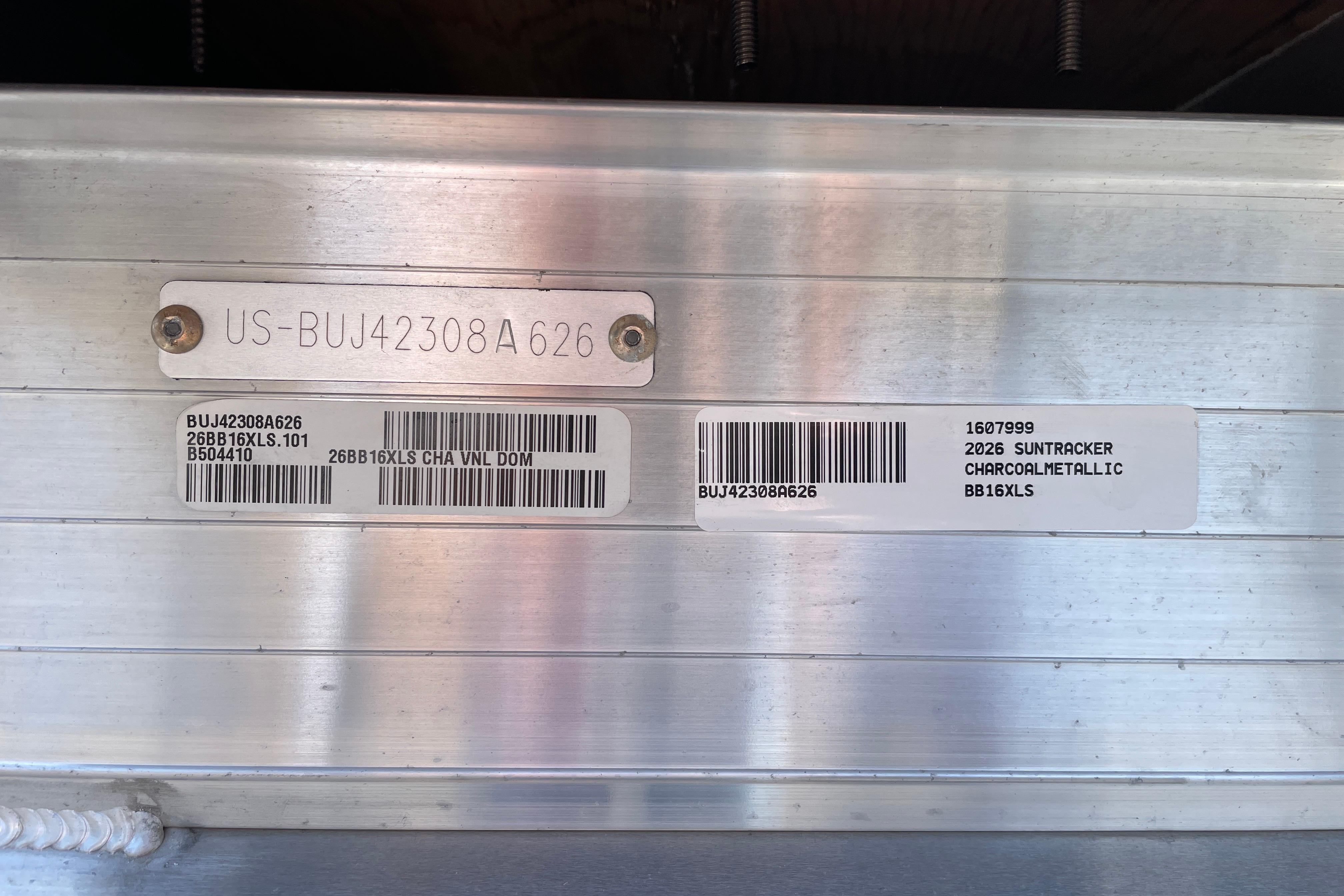 2026 Sun Tracker Bass Buggy 16 XL Select identification plate with serial numbers and barcodes.
