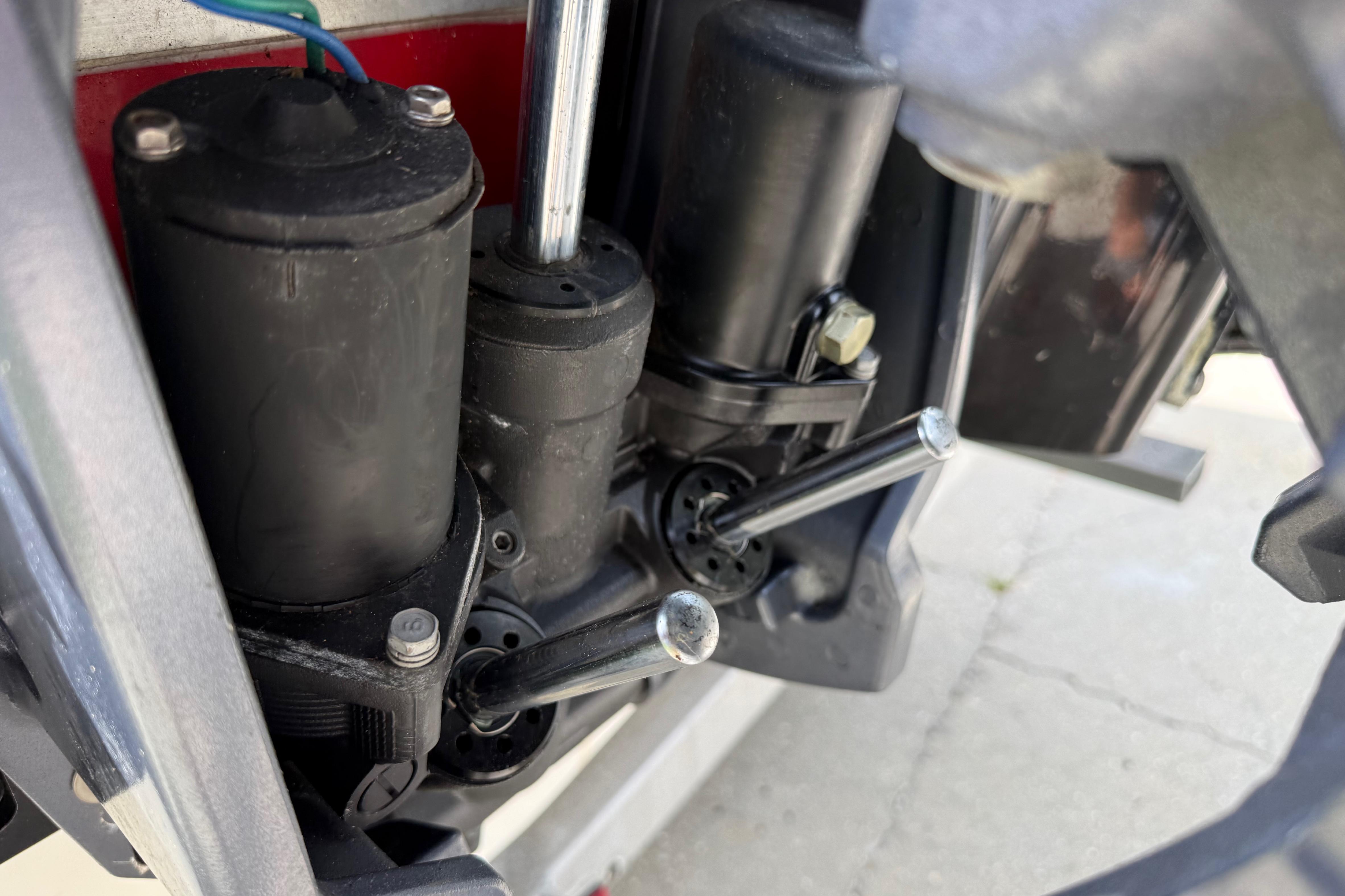 Close-up of a 2012 Clearwater 2000 Center Console boat engine components.
