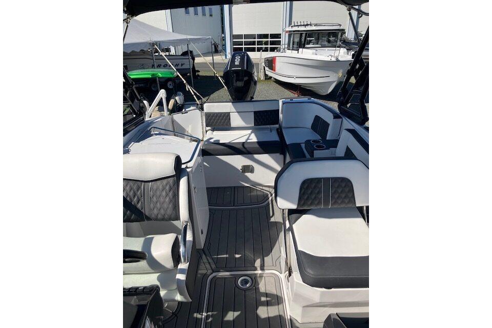 2024 Monterey M-65 boat interior with sleek seating and modern design.