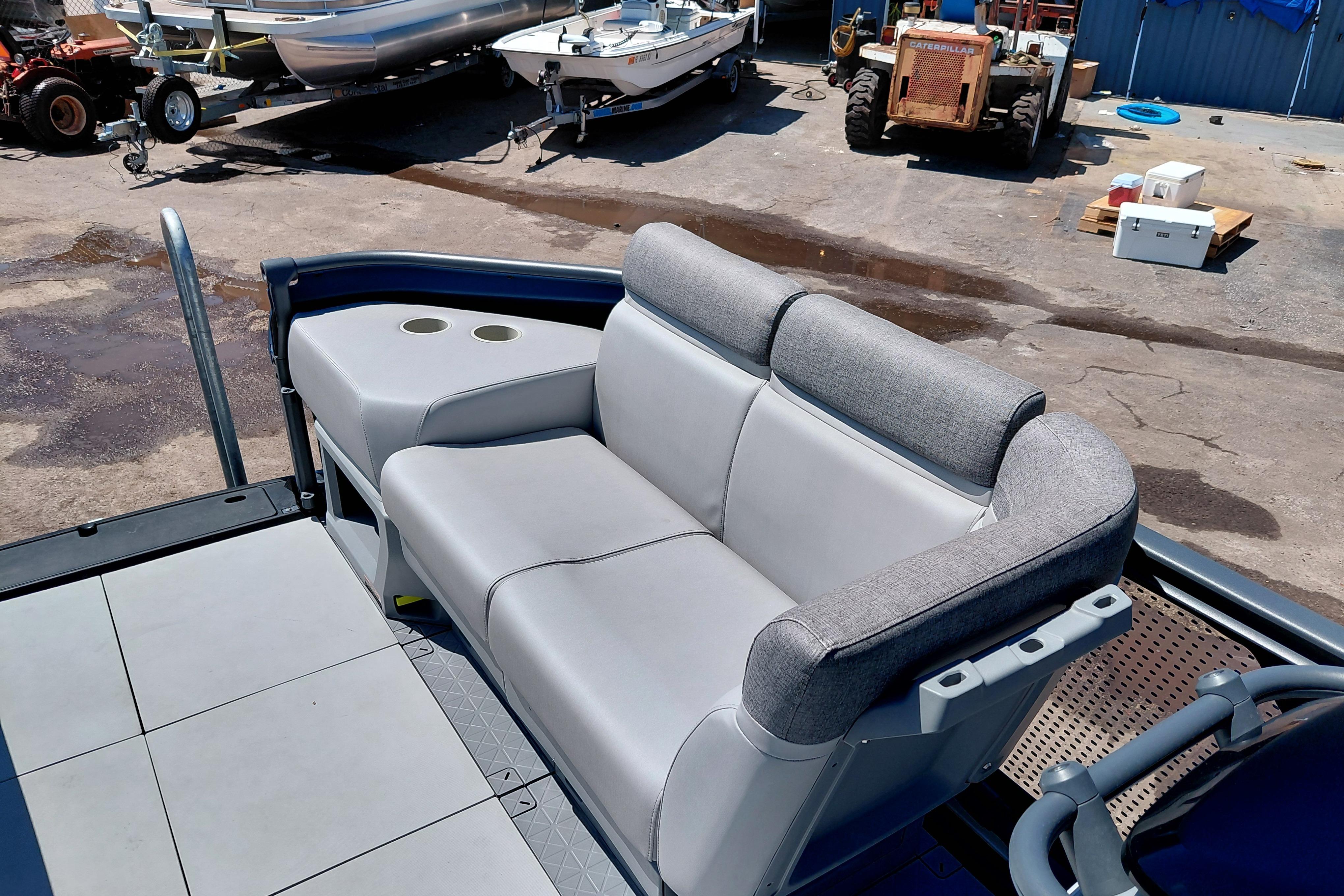 2024 Sea-Doo Switch Cruise 18 boat interior with comfortable seating and cup holders.