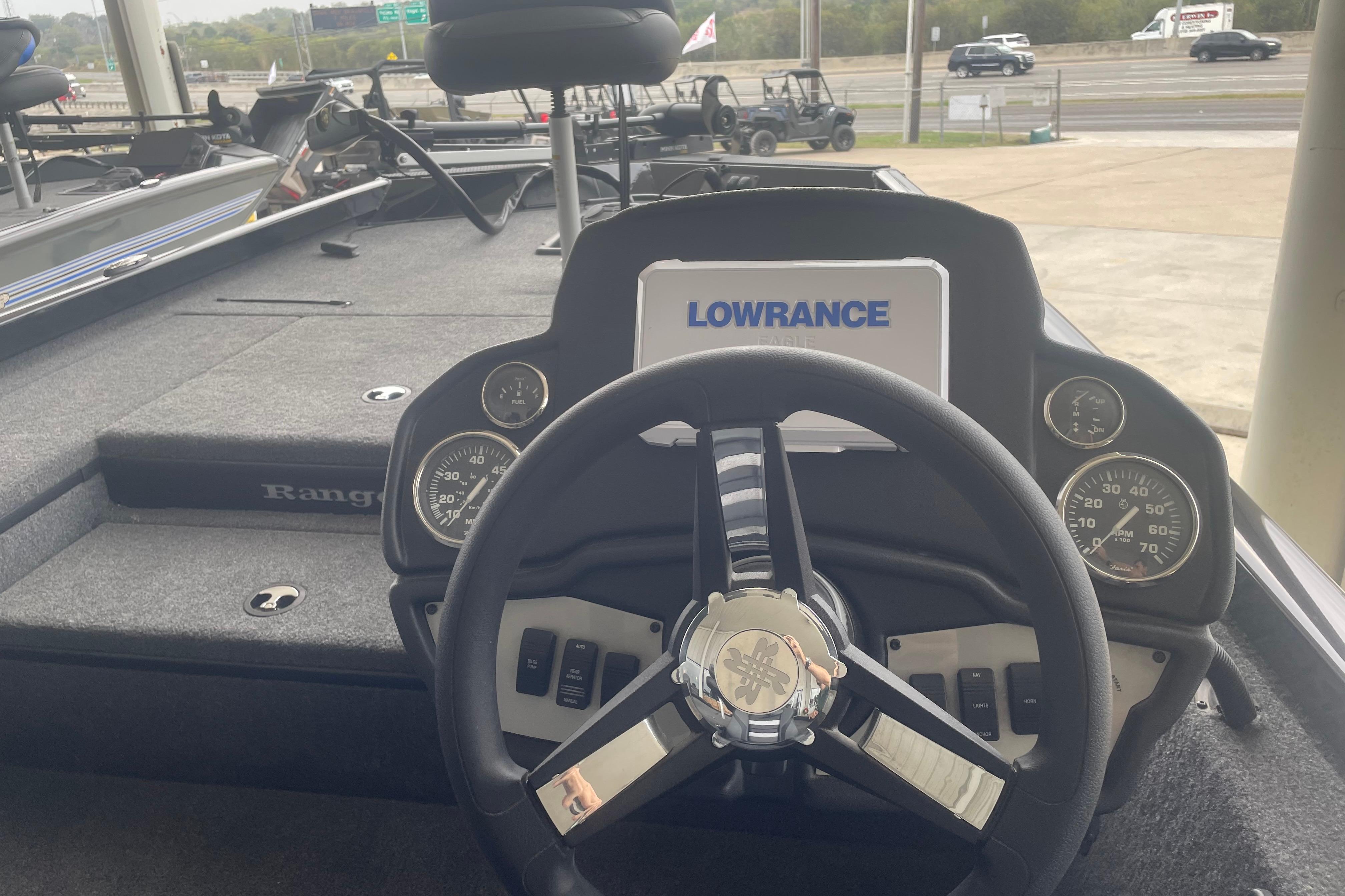 2026 Ranger RT178 boat dashboard with Lowrance display and steering wheel.