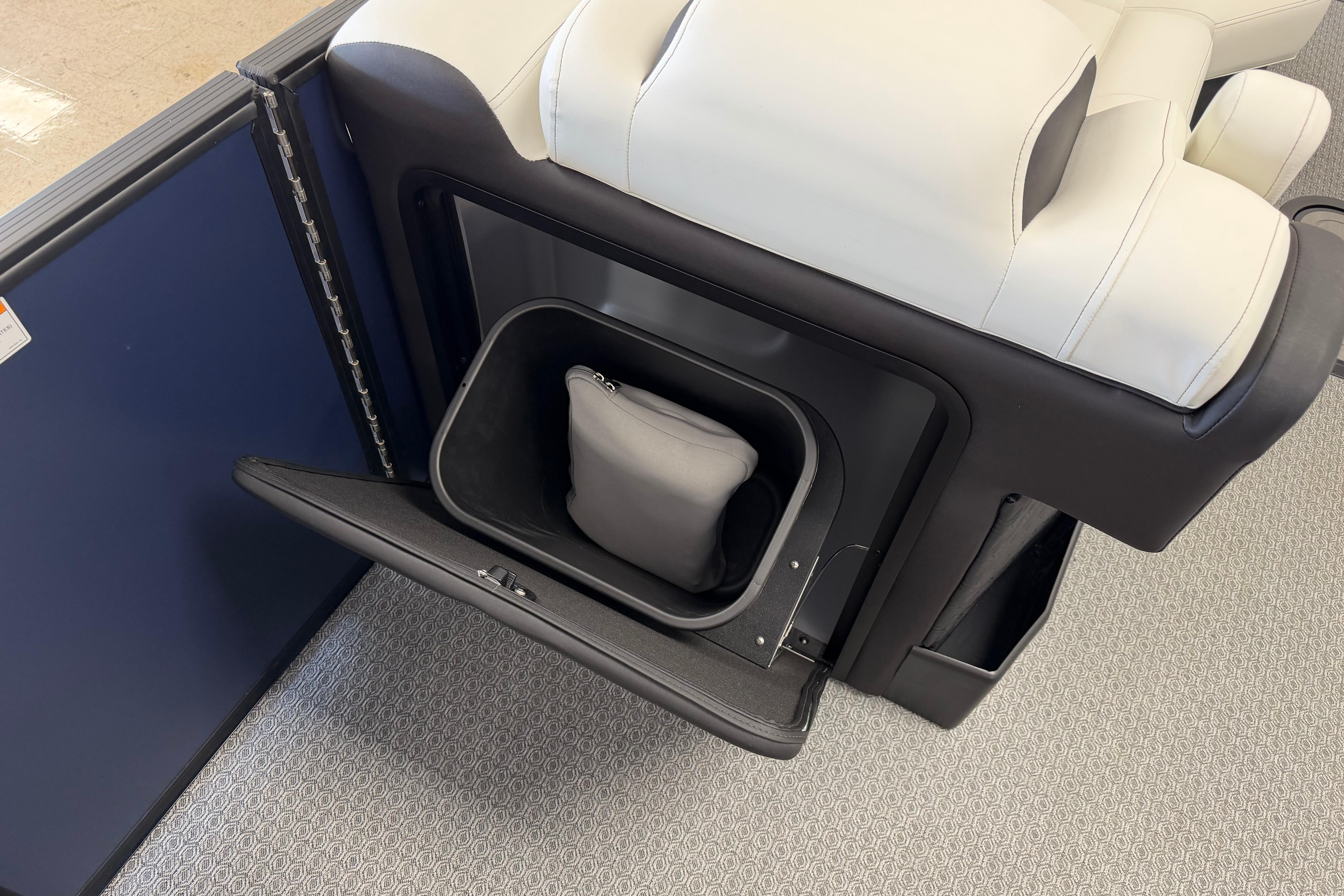 Luxury Evotti 721CS seat with integrated storage compartment, showcasing modern design, 2026 model.