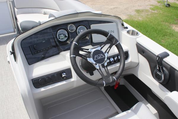 2025 Avalon LSZ Quad Lounger dashboard with steering wheel and control panel.