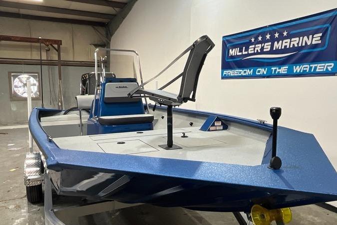 2025 SeaArk Shadow 187T boat in showroom, blue exterior, Miller's Marine banner.