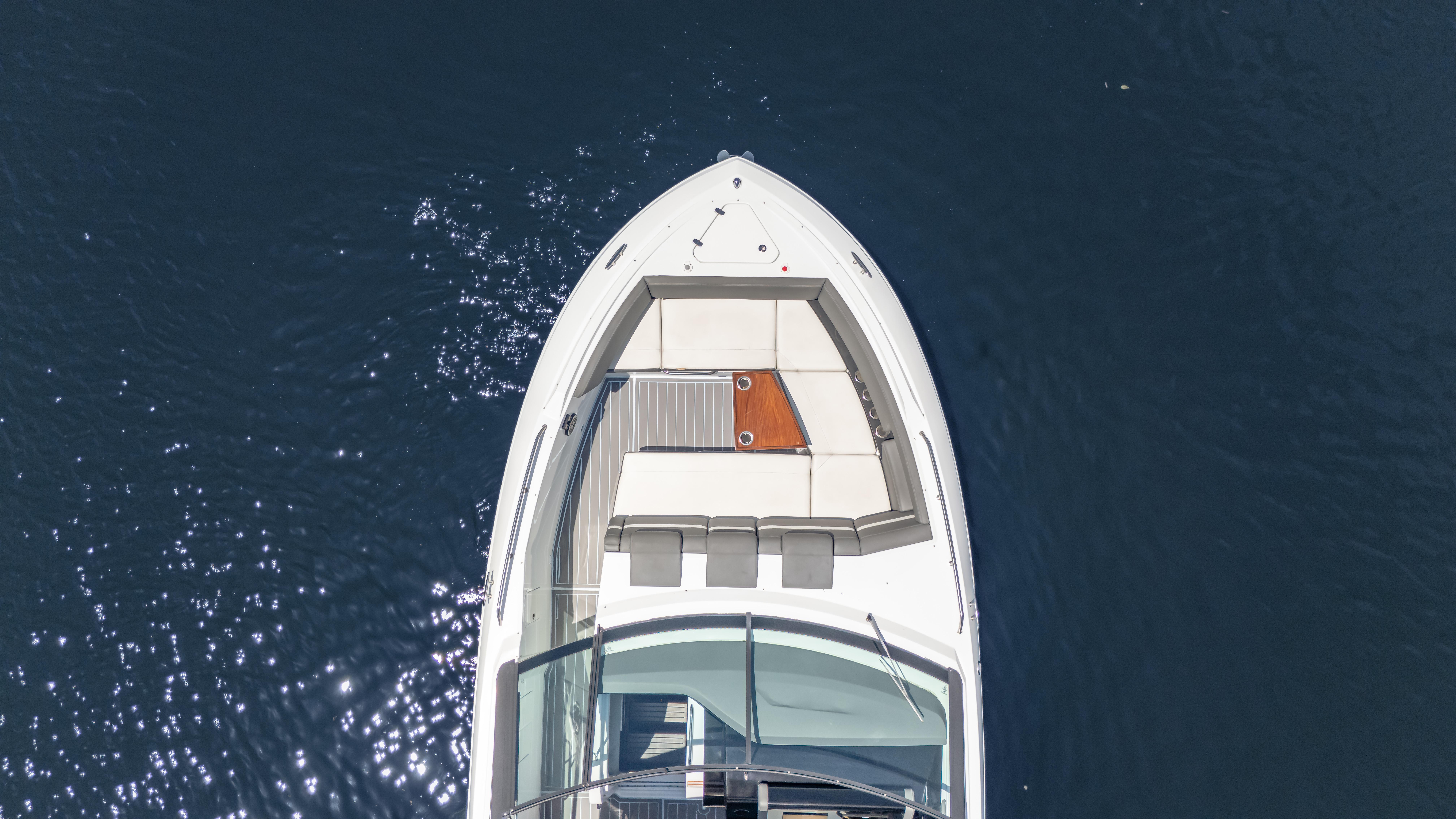Aerial view of 2021 Cruisers Yachts 38 GLS on calm water.