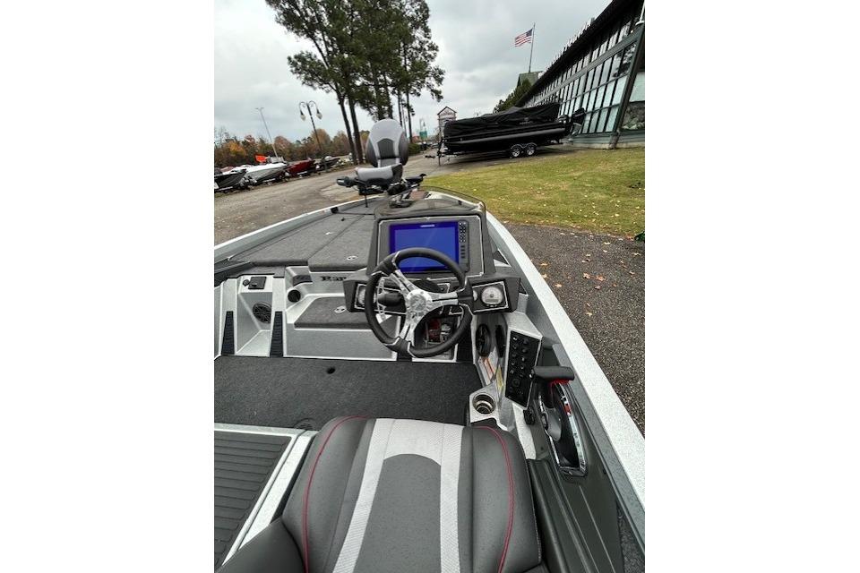 2024 Ranger Z519 Ranger Cup Equipped boat interior with steering wheel and control panel.