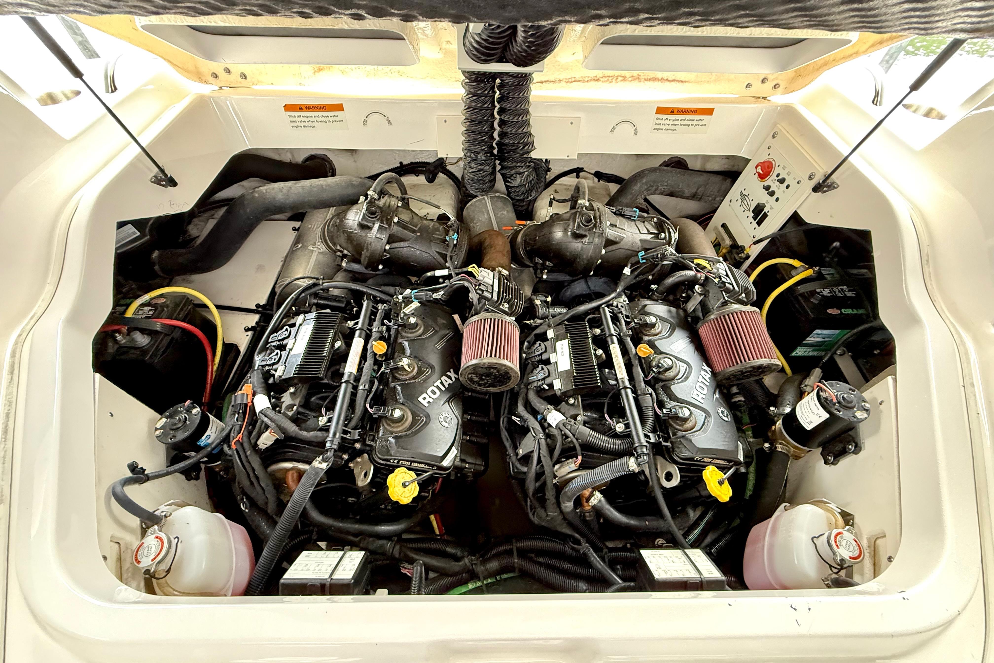 2019 Chaparral Vortex 223 VRX engine compartment with dual Rotax engines.