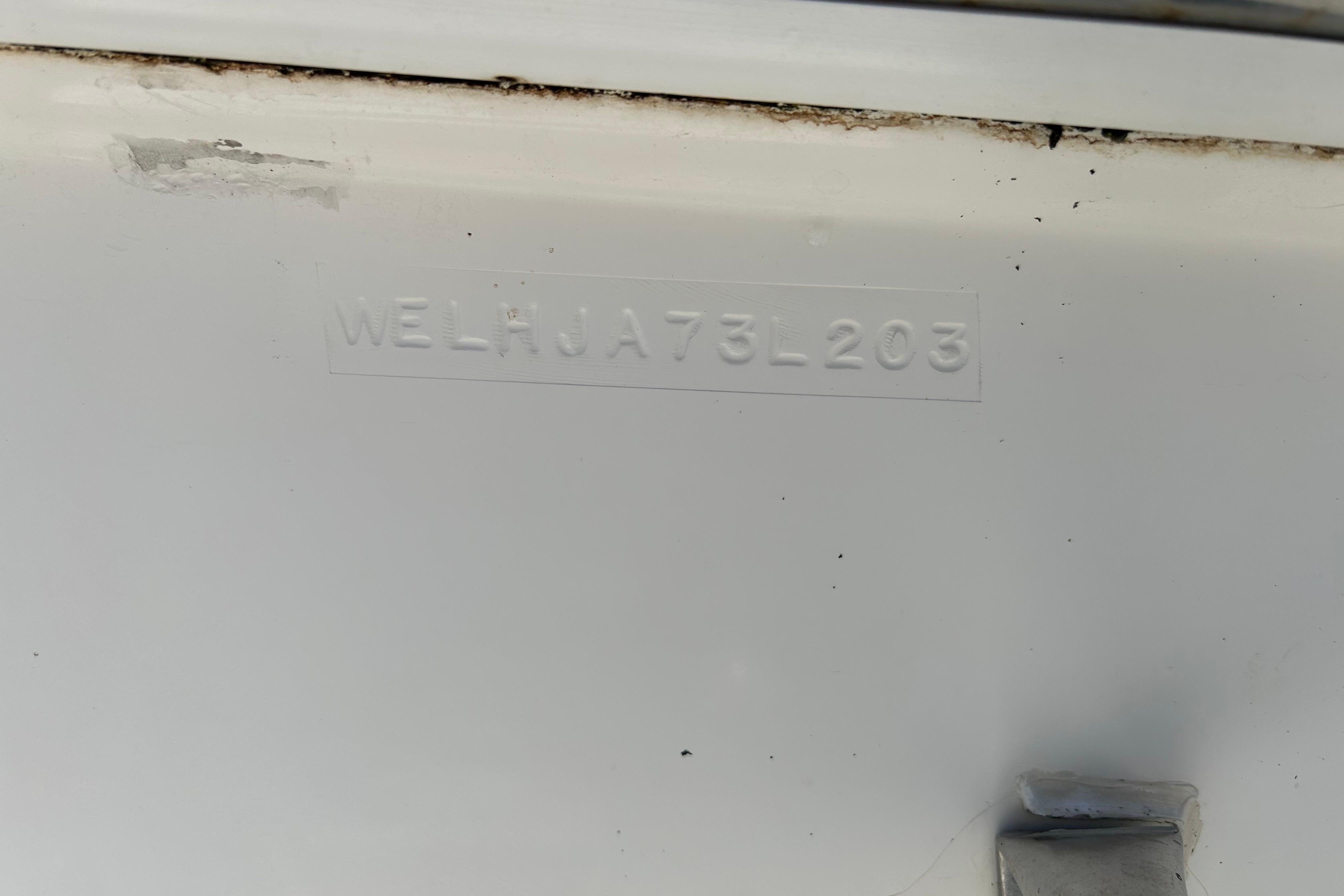 Hull identification number on 2003 Wellcraft 220 Coastal boat.