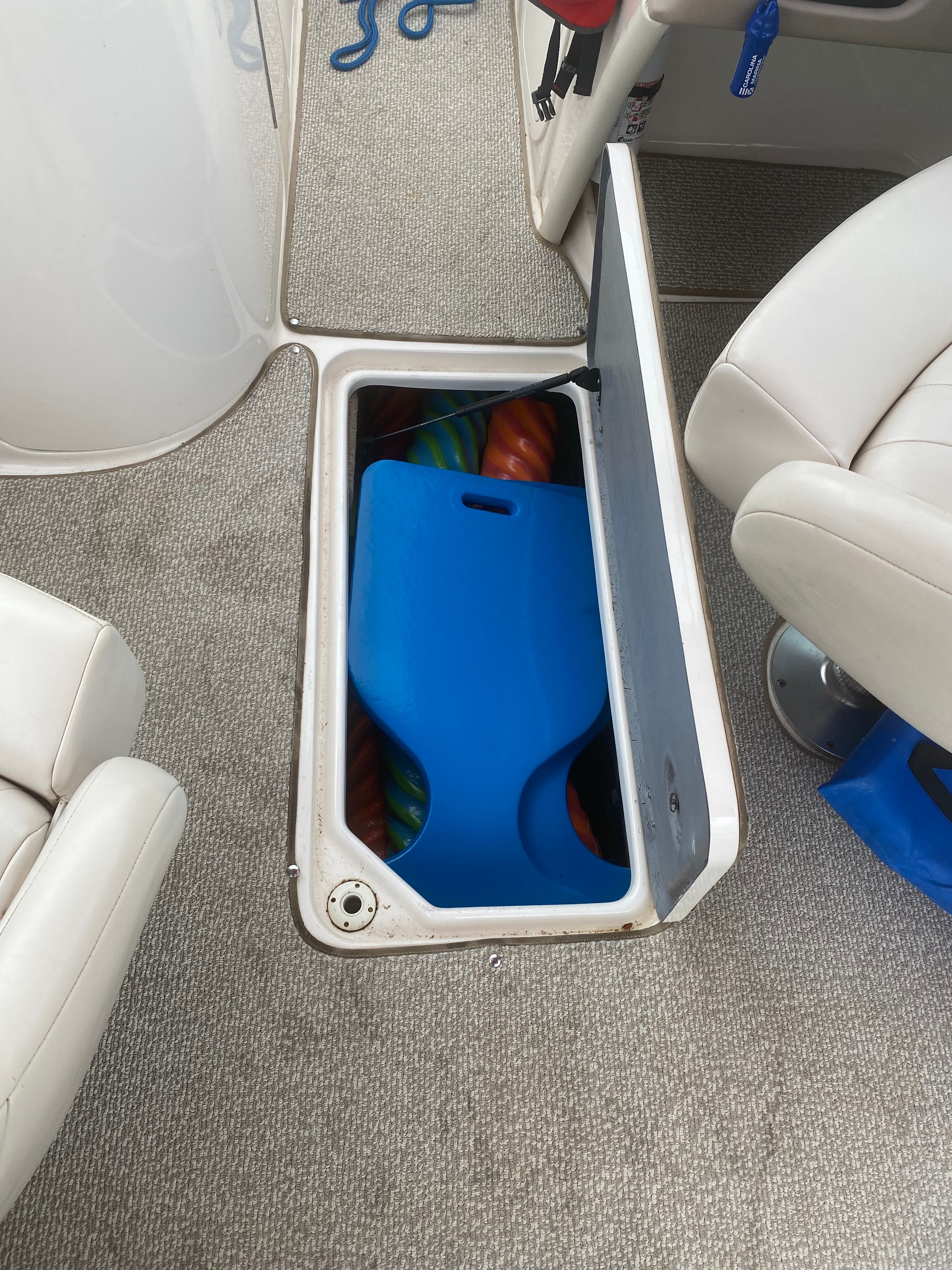 Storage compartment in Chaparral 230 SSi boat, year 2000.