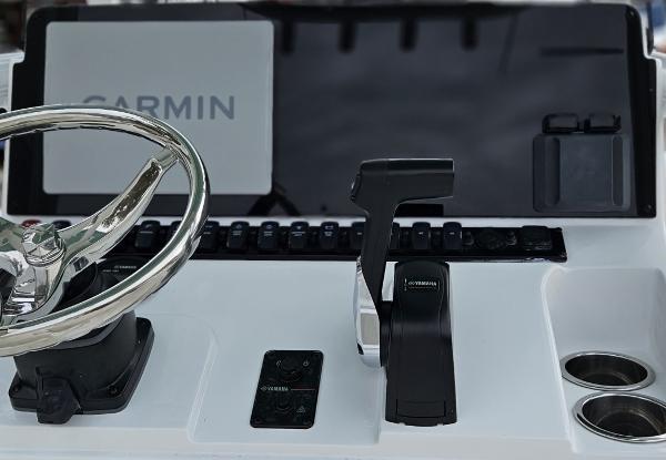 Steering console of 2026 Sea Hunt BX 22 BR with Garmin navigation system.