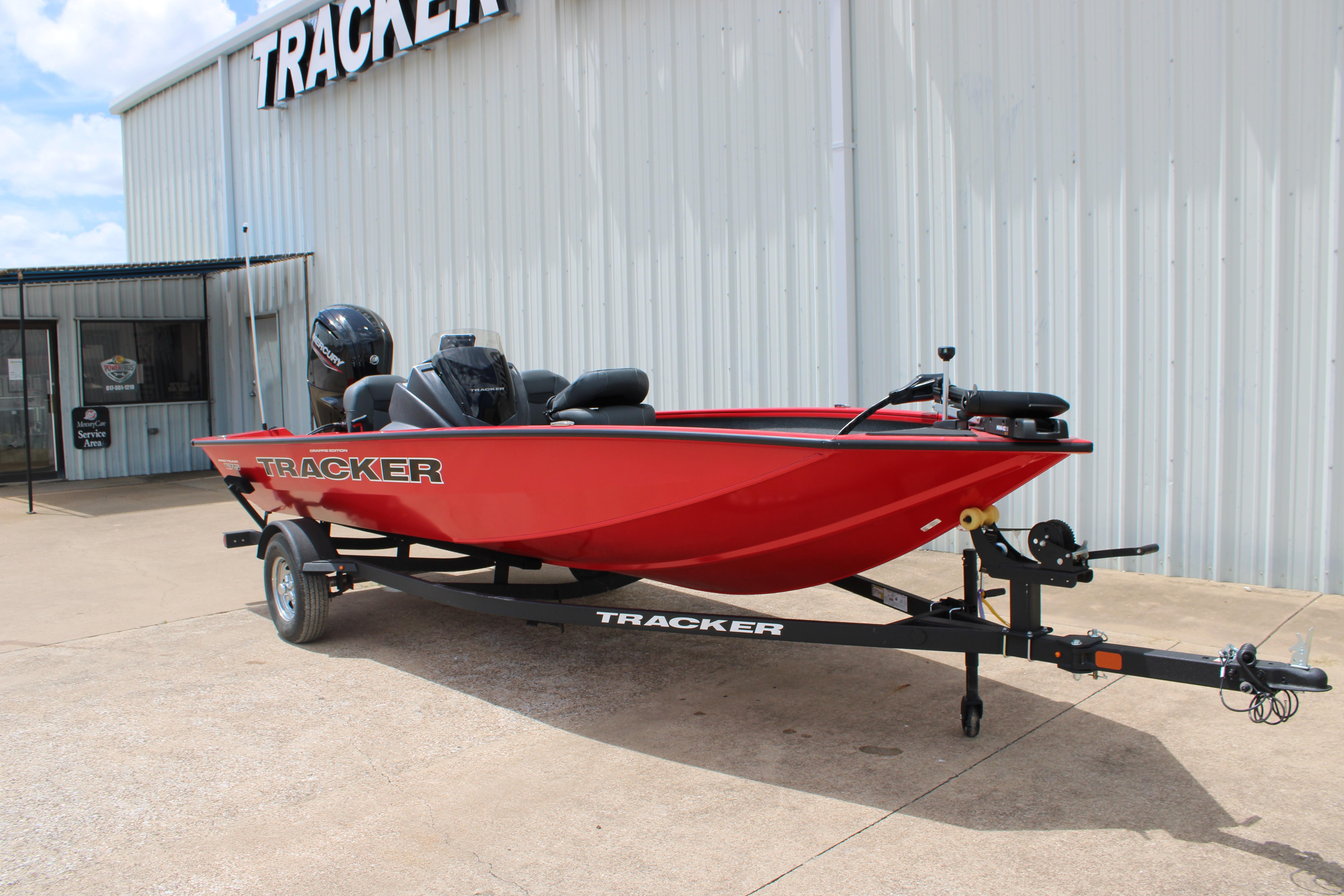 2026 Tracker Pro Team 175 Crappie Edition boat in vibrant red on trailer.