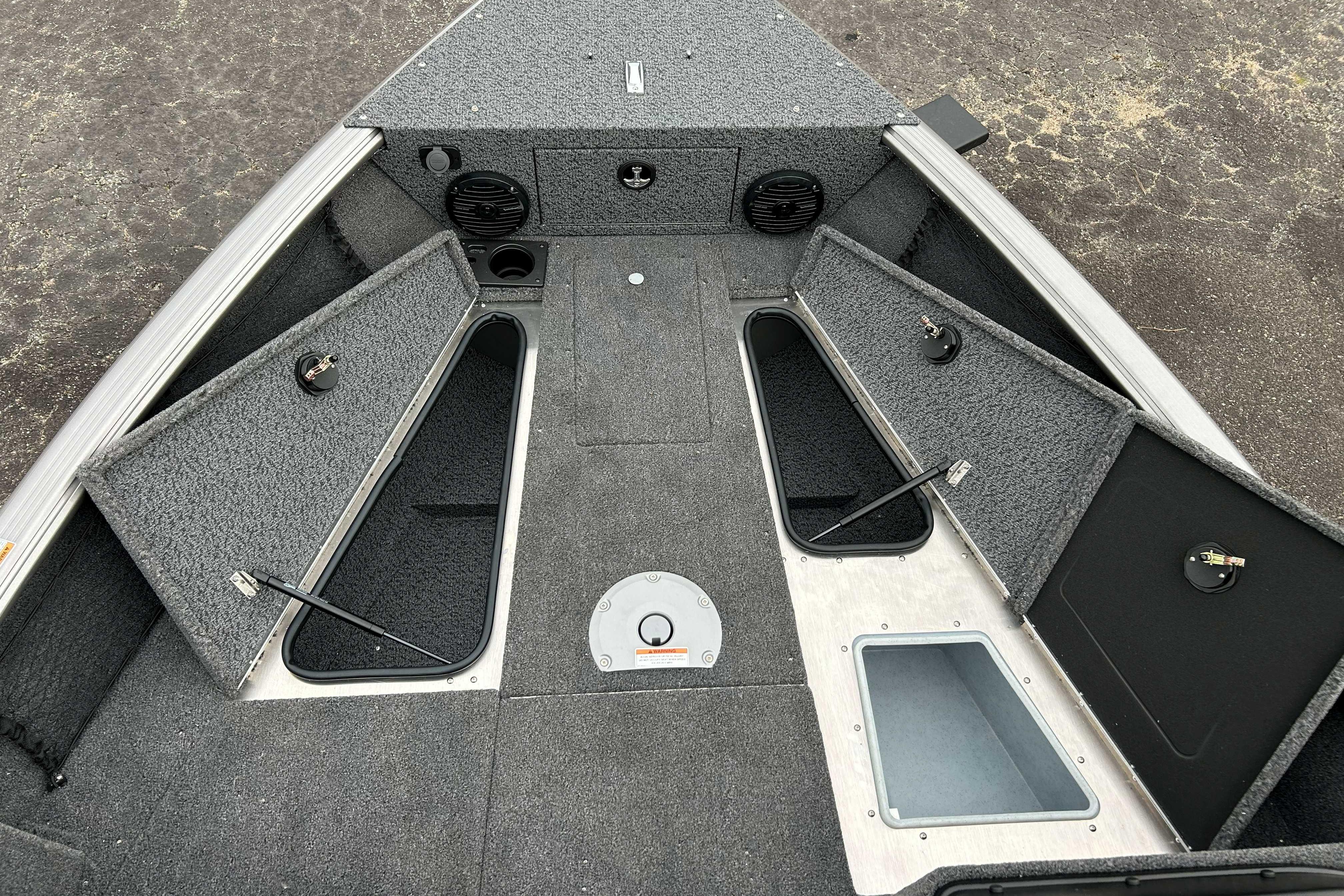 2027 Lund 1775 Impact XS boat interior with open storage compartments.