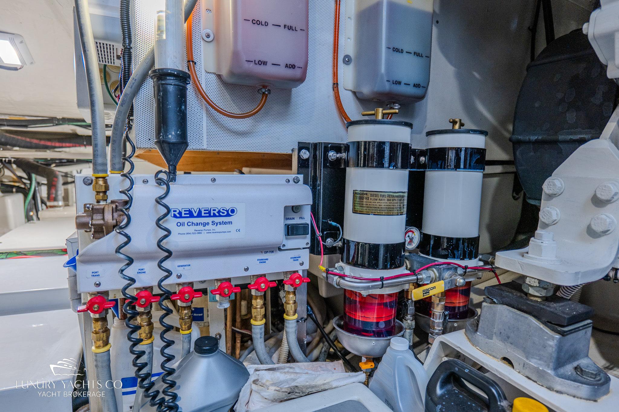Engine room of 2010 Azimut 62S yacht with Reverso oil change system.