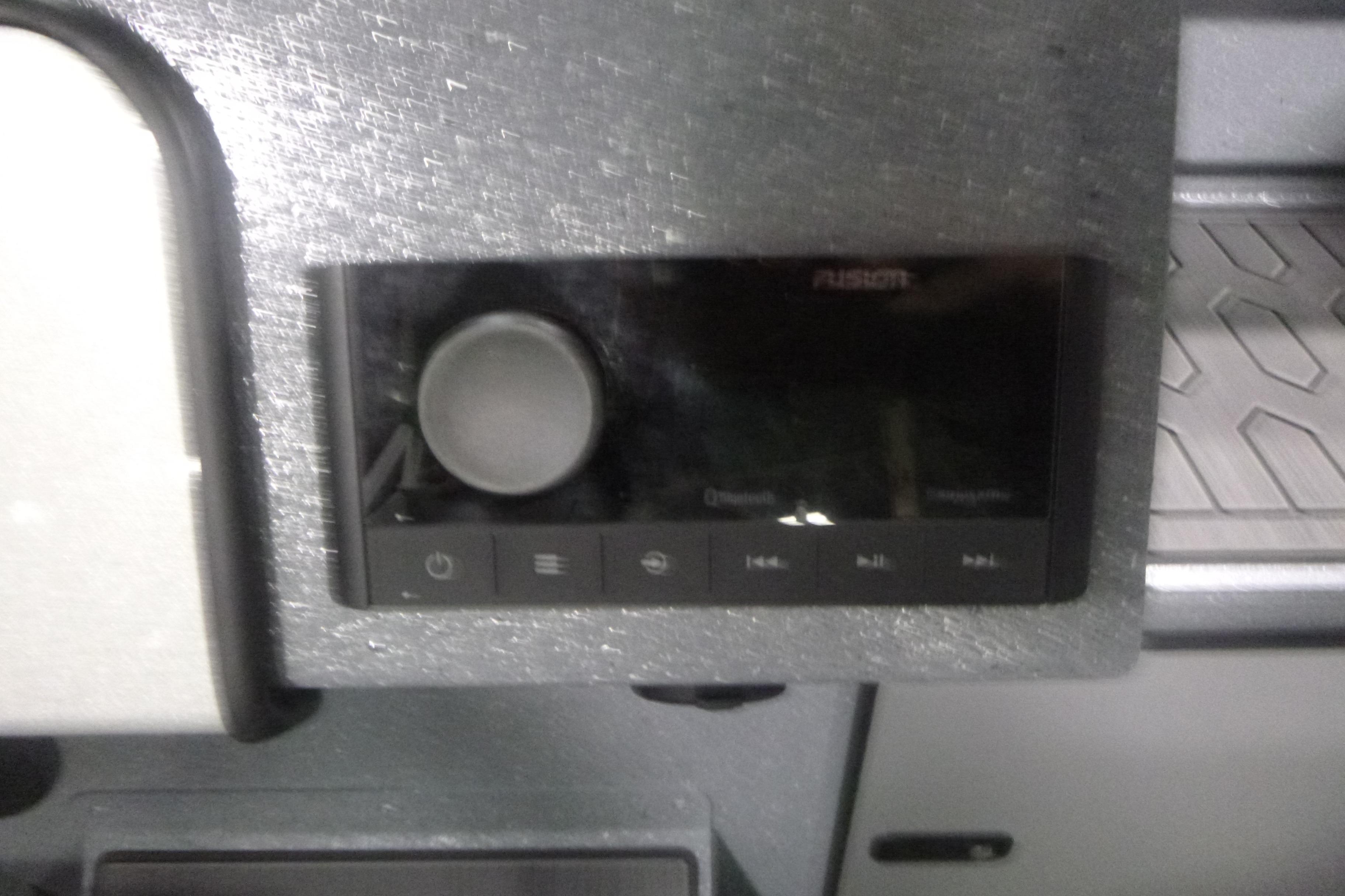 Control panel of KingFisher 2025 Falcon, featuring a Fusion audio system.