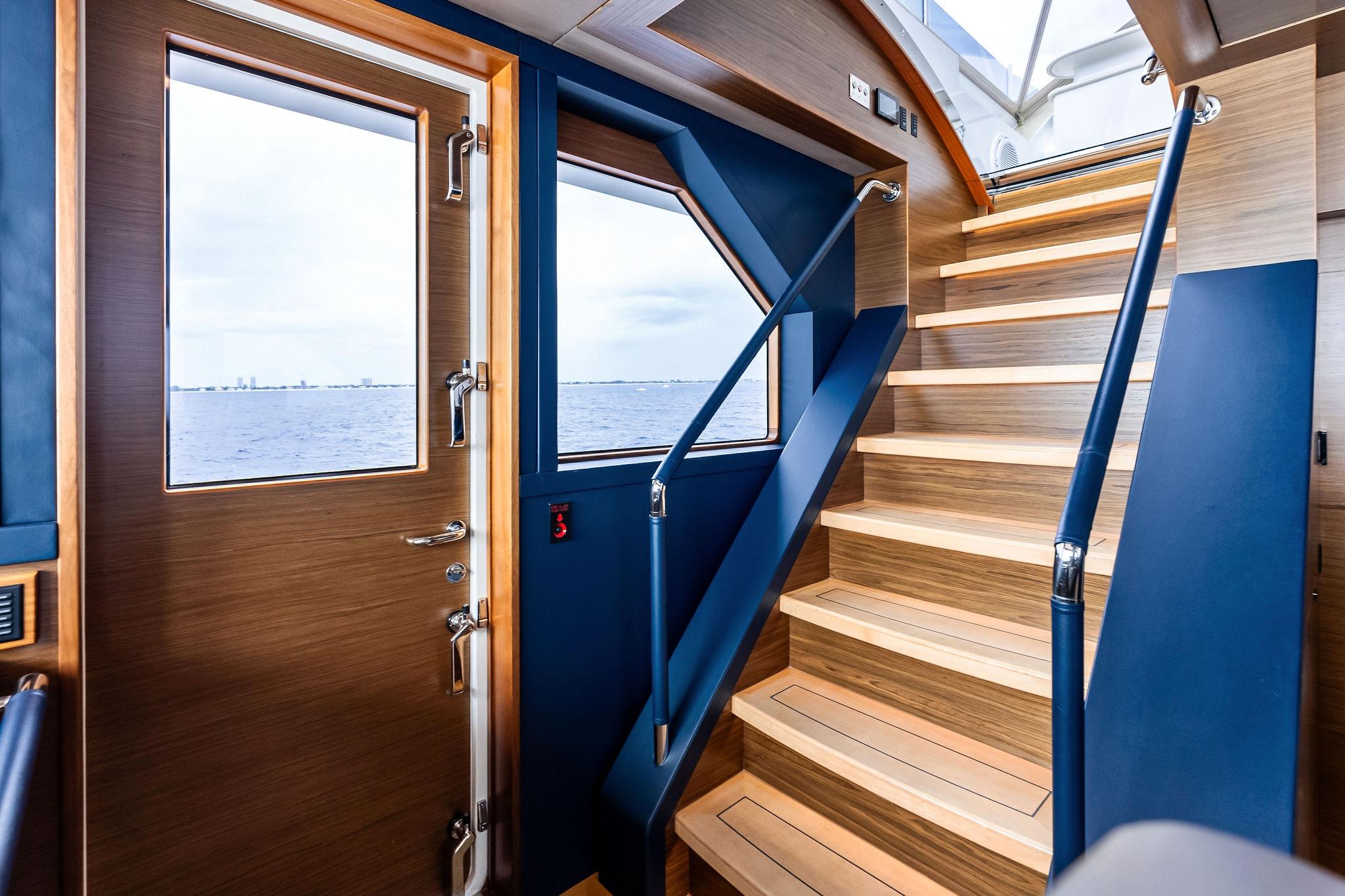 Pilothouse stairs to flybridge, electric opening door