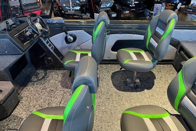 Interior of 2026 Ranger VX1888 WT boat with green-accented seats and modern dashboard.
