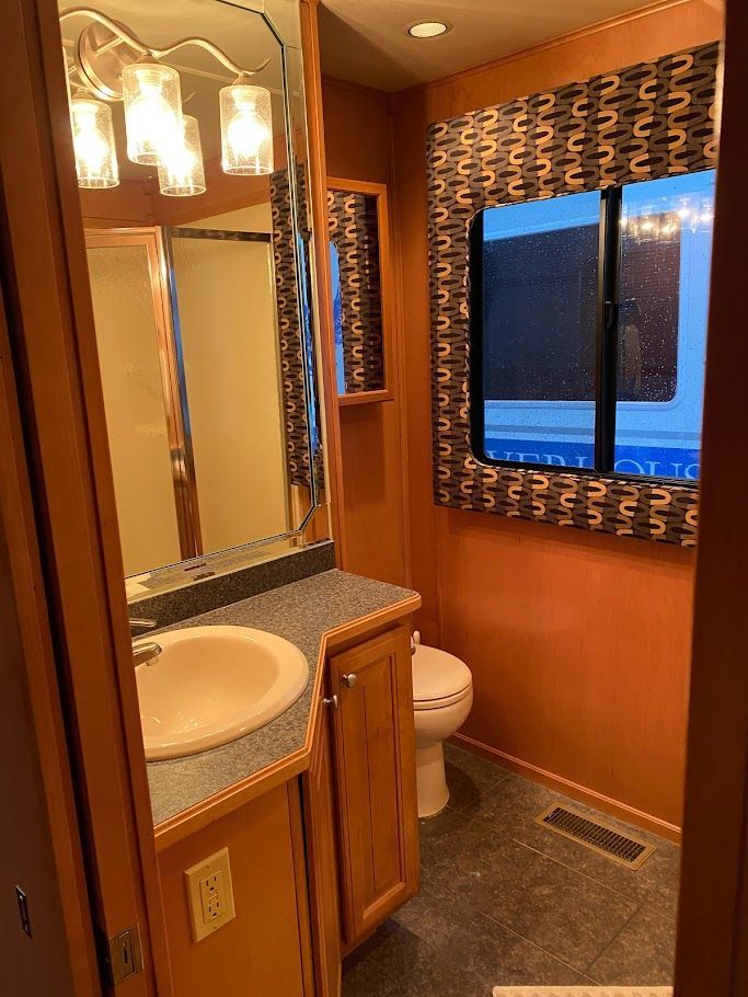 Bathroom in a 2006 Summersun Houseboats 16x68 model.