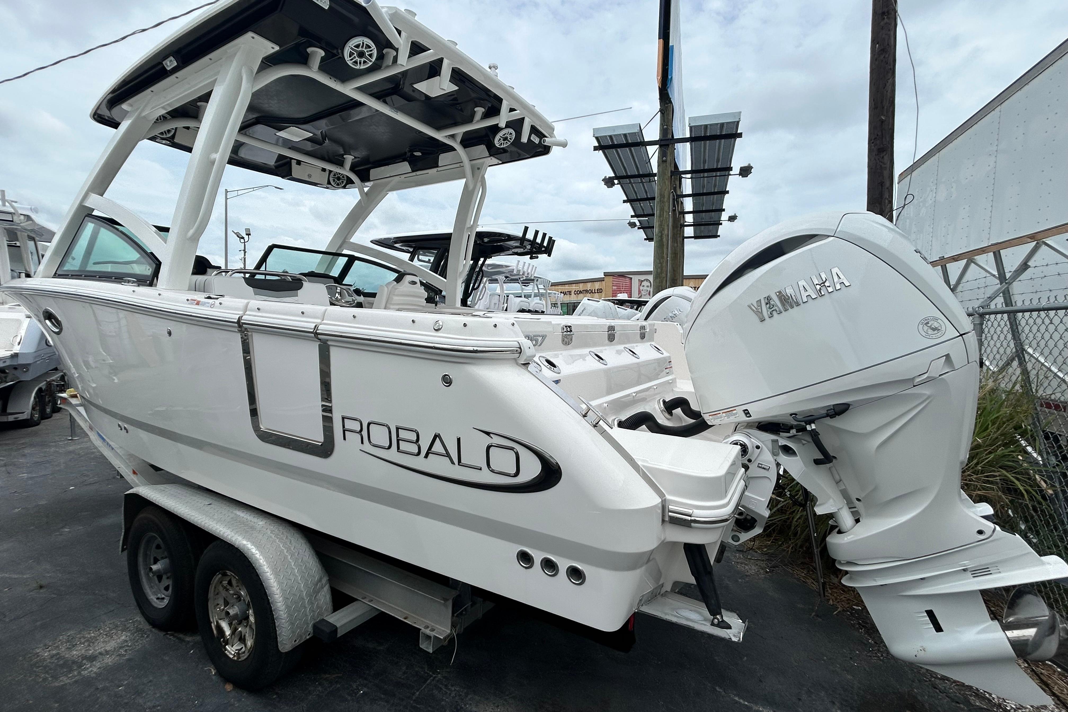 2026 Robalo R257 Dual Console boat with Yamaha engine on trailer.