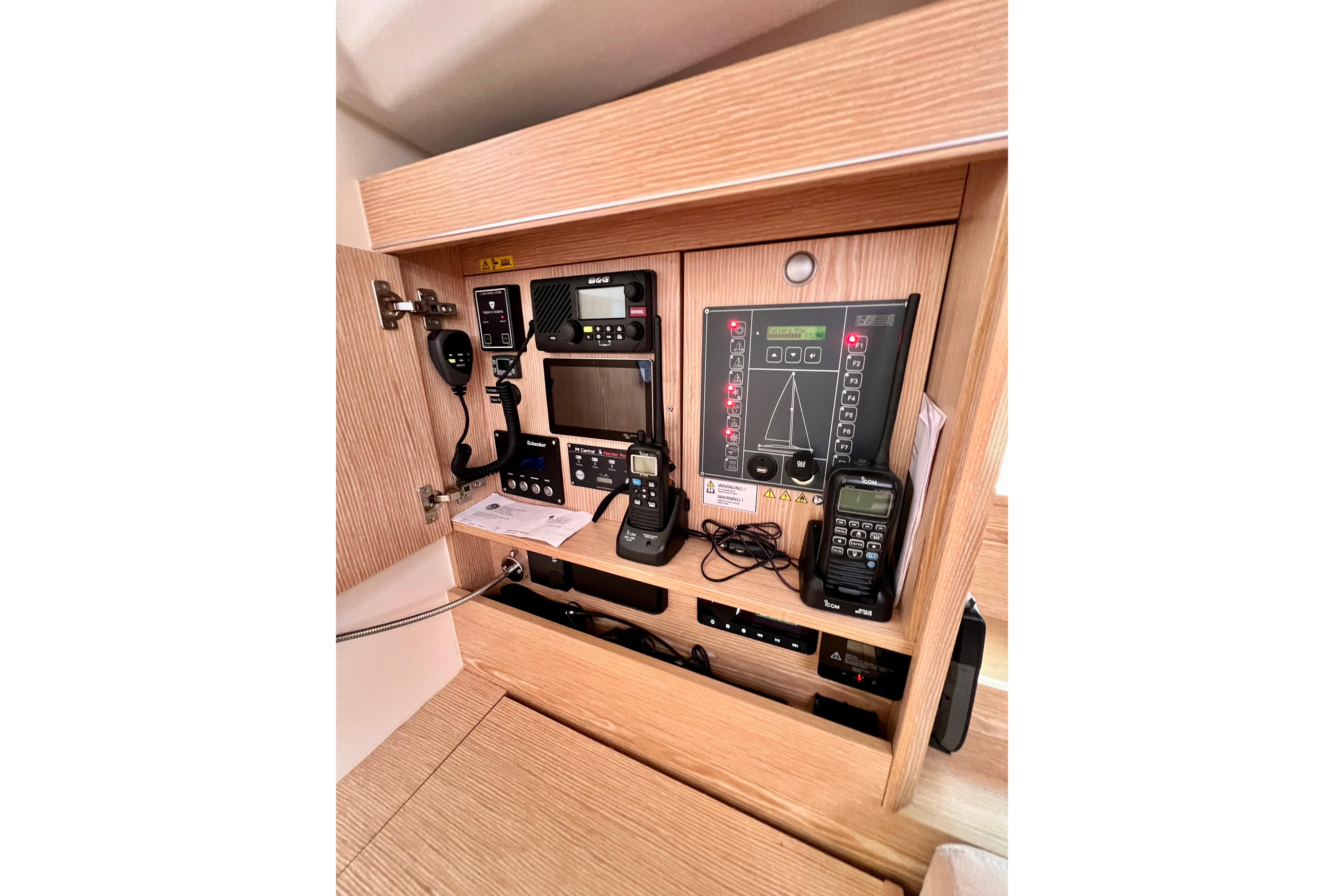 Control panel of a 2016 Hanse 455 yacht, featuring navigation and communication equipment.