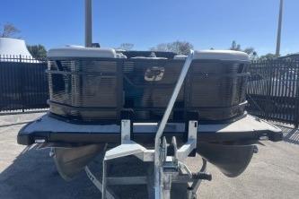 2026 Princecraft Vectra 23 L pontoon boat on trailer, front view under clear sky.