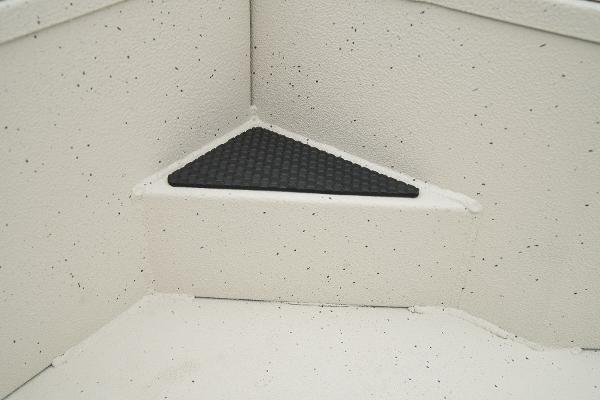 Manufacturer Provided Image: Manufacturer Provided Image: Interior of 2025 Ranger RB210 boat with non-slip triangular mat.