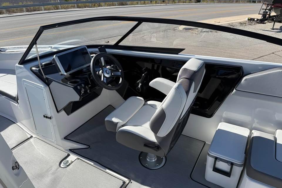 2026 Yamaha Boats AR250 cockpit with modern steering and seating design.