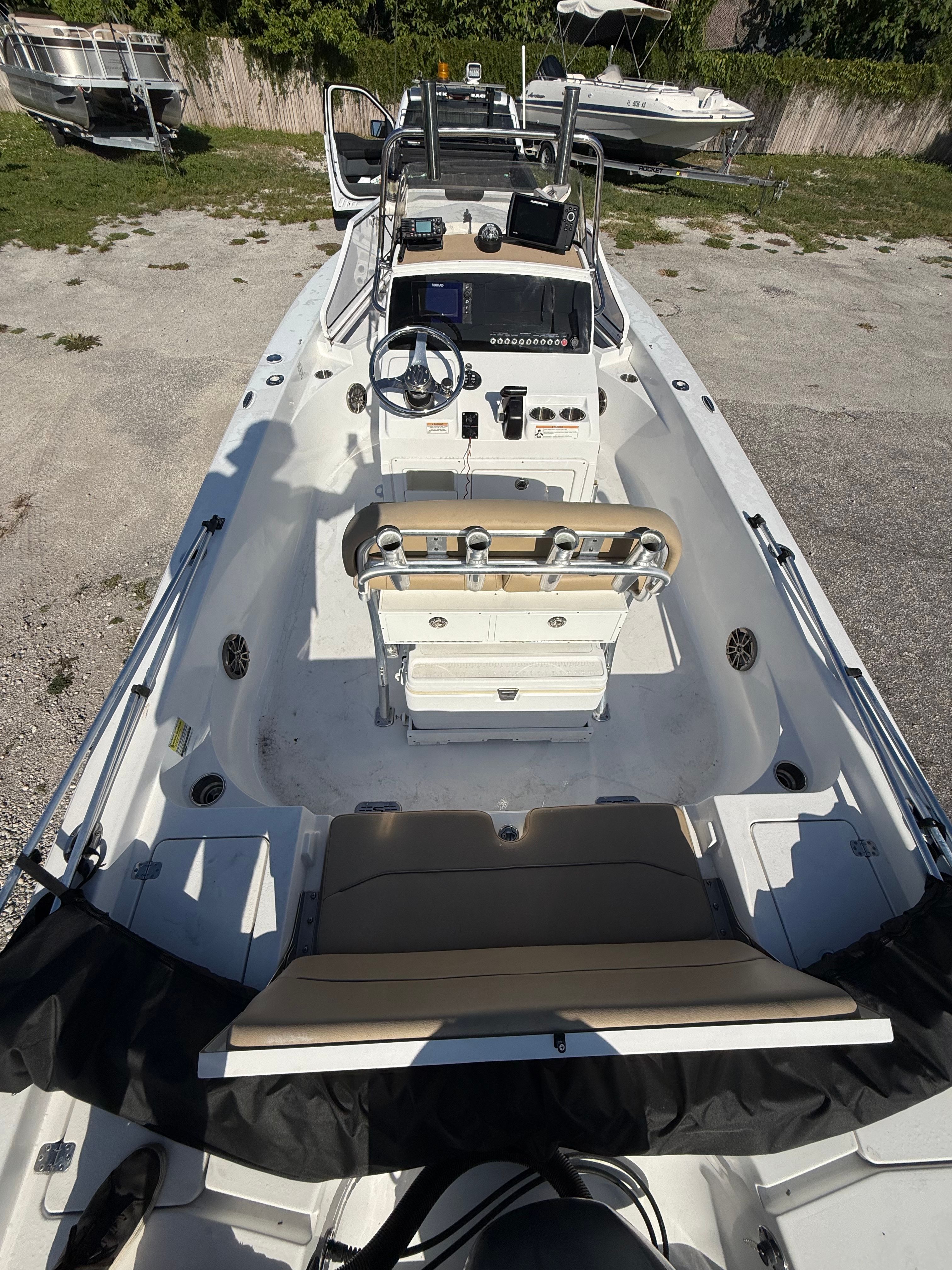 Interior view of a 2016 Sportsman Masters 227 Bay Boat with helm and seating area.