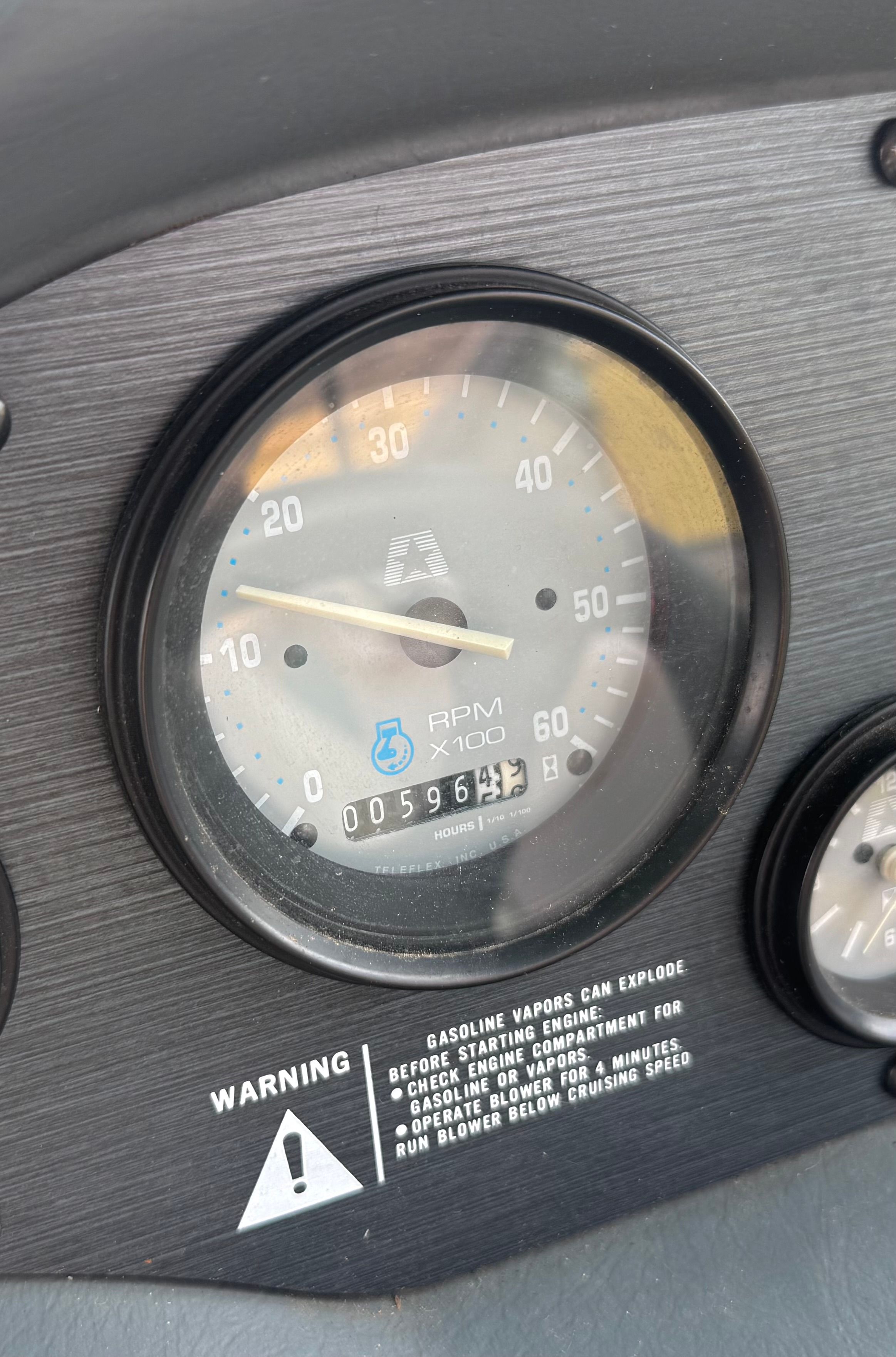 Tachometer of a 1993 MasterCraft Maristar boat, showing 596.2 hours.