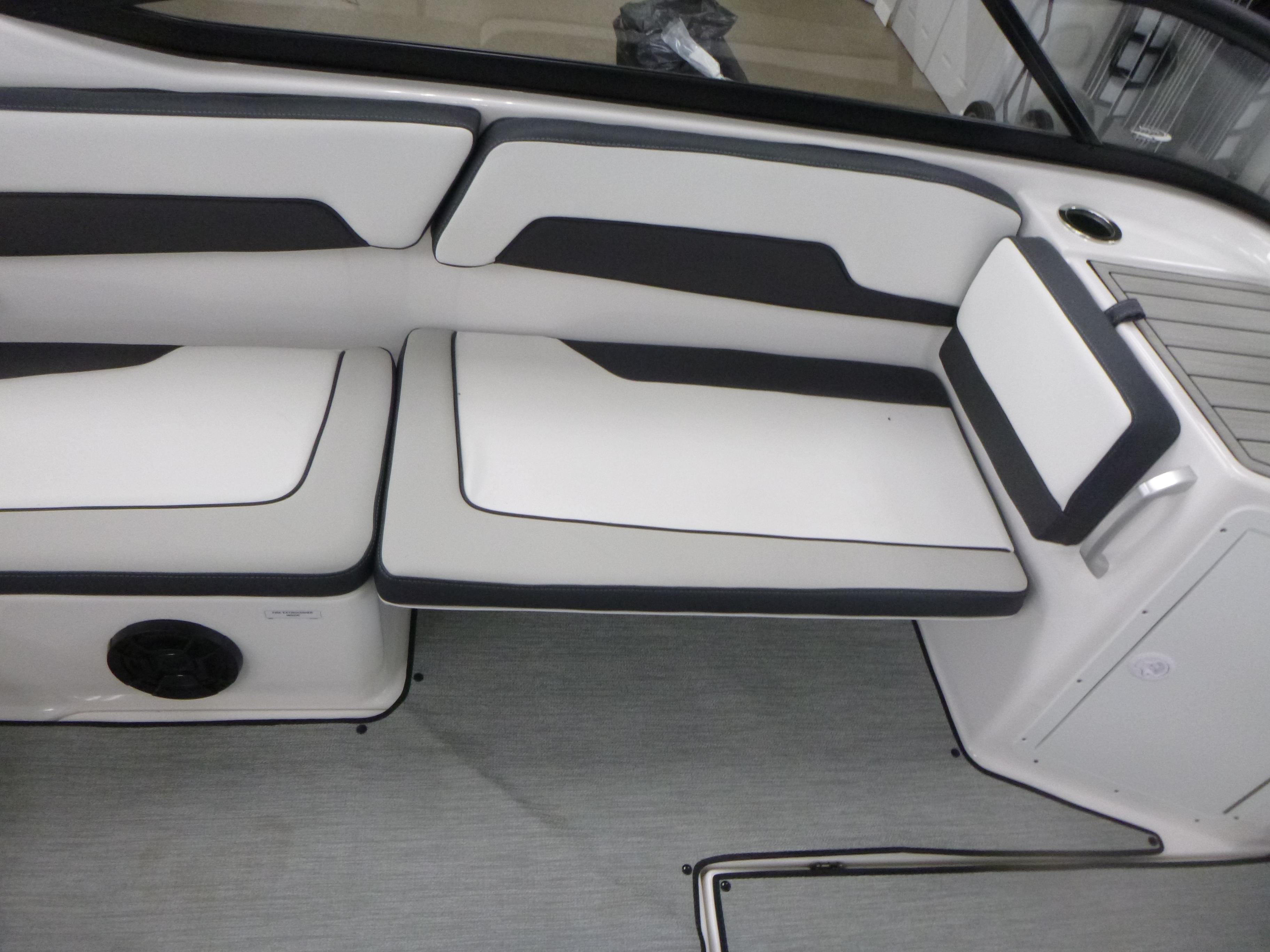 2025 Yamaha AR195 boat interior with sleek white and black seating.
