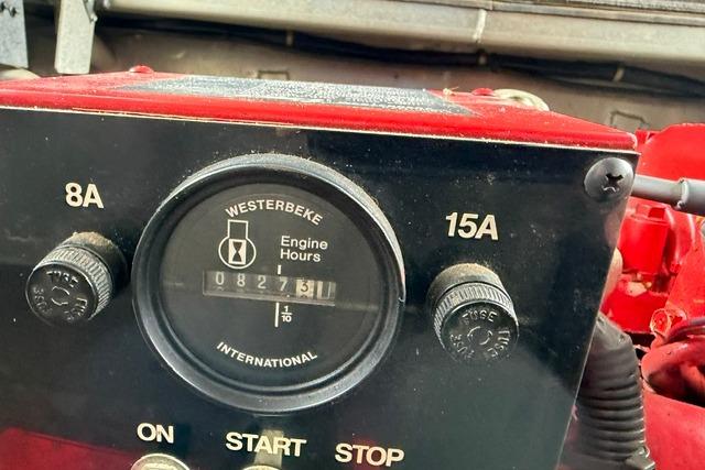 Westerbeke engine hour meter on 1997 Stardust Houseboat, model 18x83, showing 827.3 hours.
