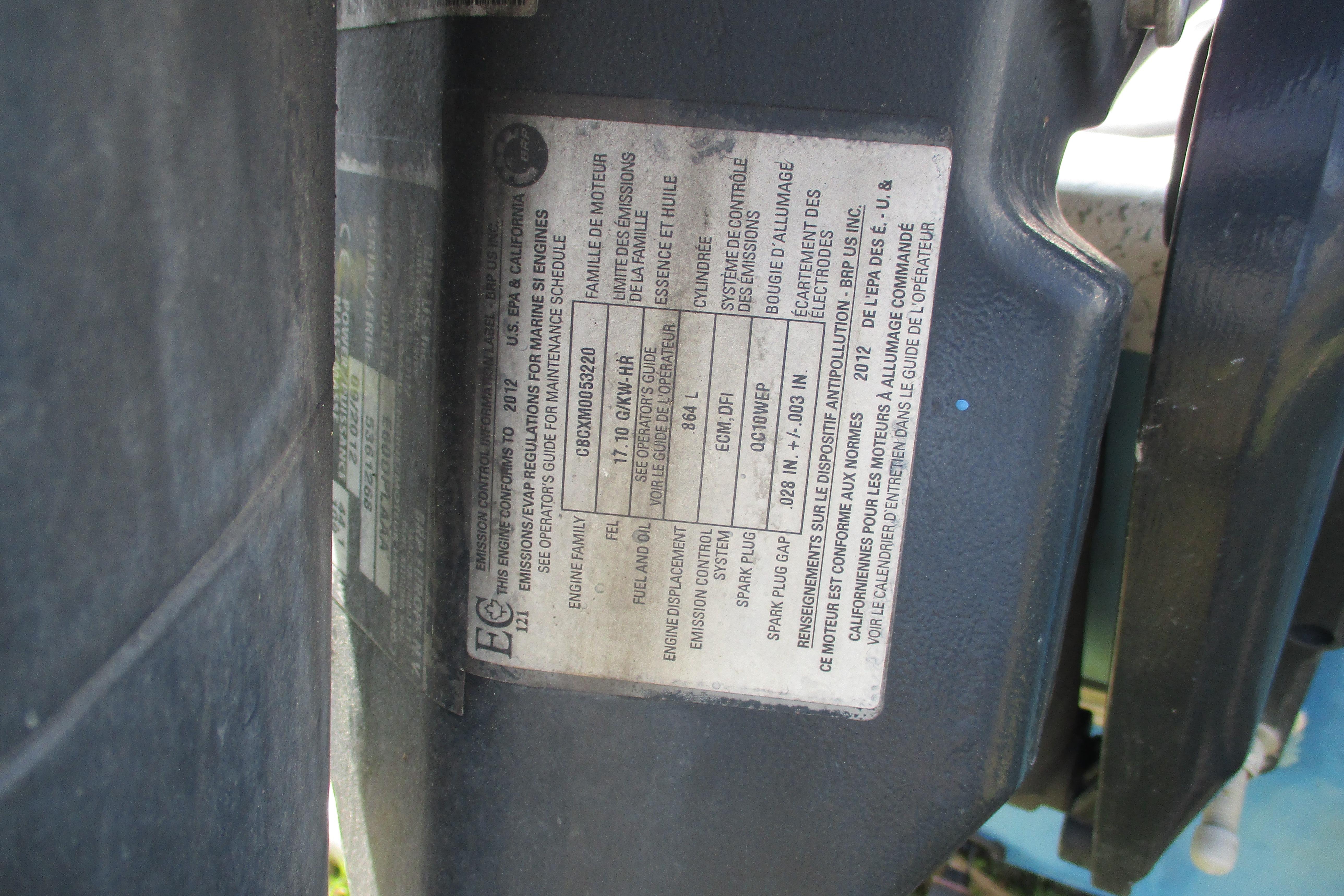 Label on 2012 Stumpknocker 17 SPORT boat engine, detailing emissions and specifications.