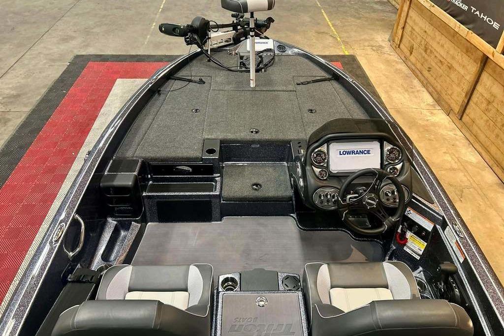 2026 Triton 18 TrX boat interior with Lowrance electronics and dual seating.