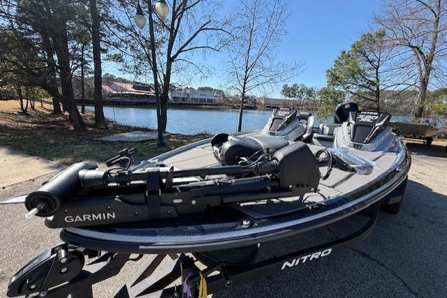 2026 Nitro Z20 XL Pro boat with Garmin equipment, parked near a scenic lake.