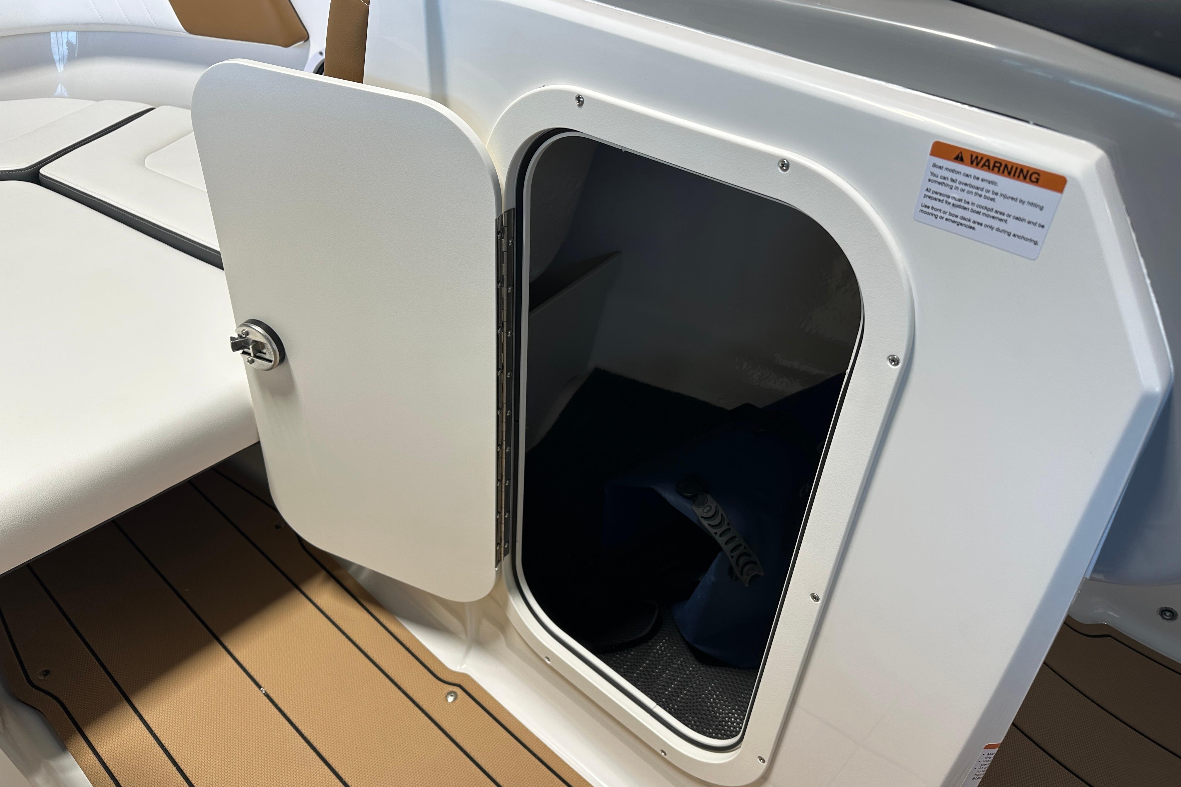 Storage compartment in Chaparral 23 SSi boat, year 2026.