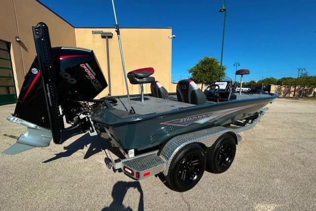 2025 Ranger ALPHA 208 boat with dual axle trailer and powerful outboard motor.