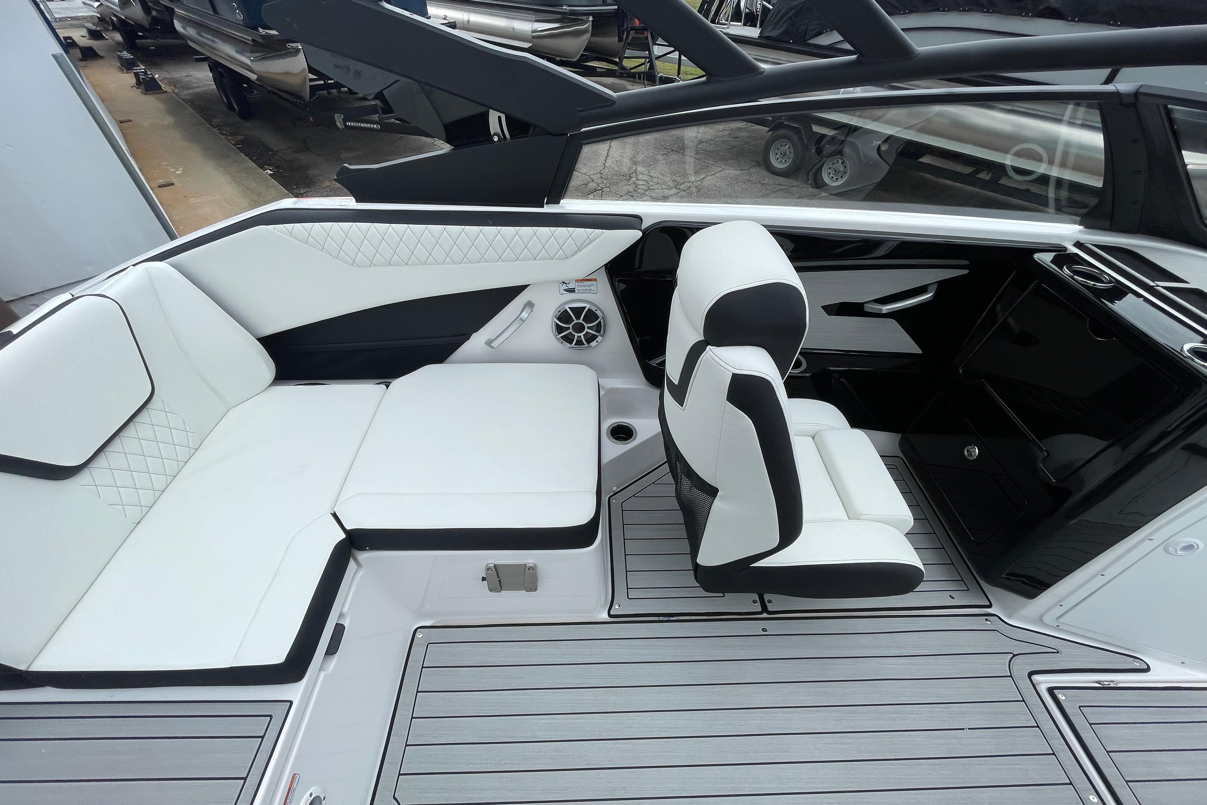 2026 Yamaha Boats 222S interior with white seating and modern design.