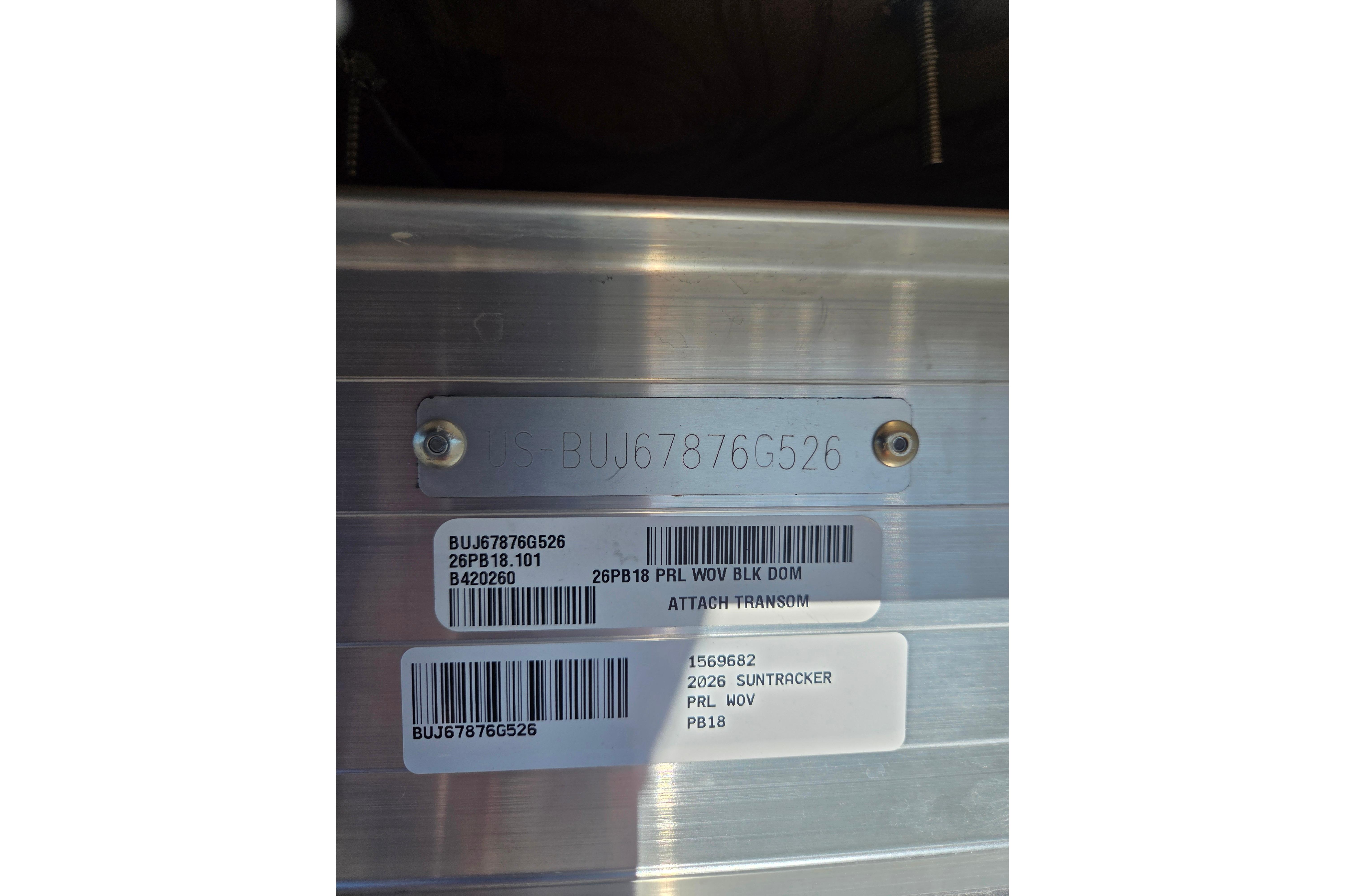 2026 Sun Tracker Party Barge 18 DLX identification plate with serial numbers and barcodes.