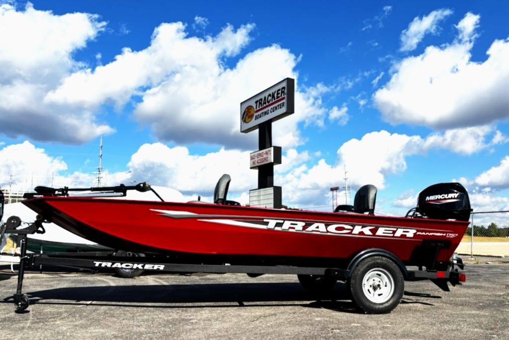 2025 Tracker Panfish 17 boat on trailer under blue sky at Tracker Boating Center.