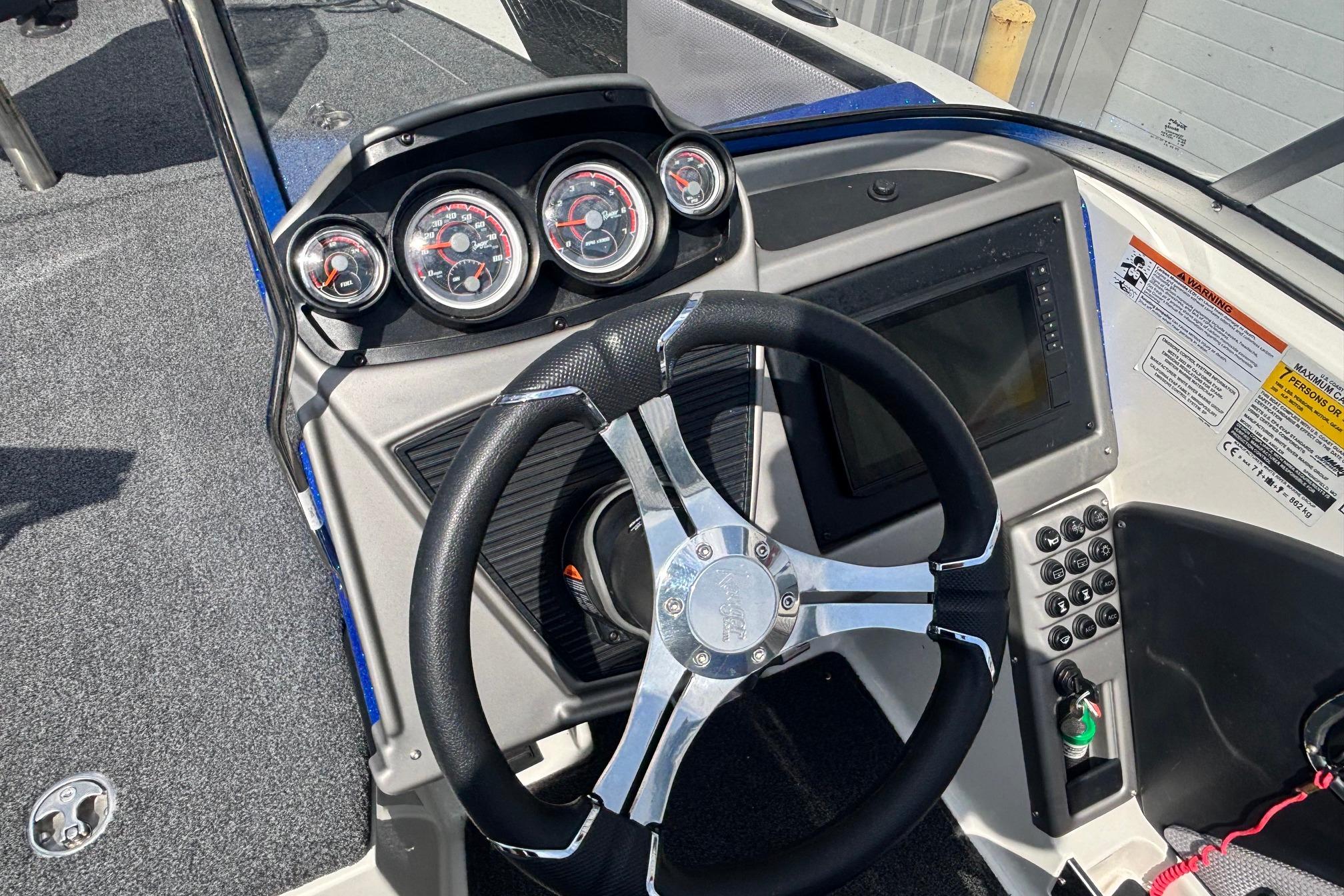2022 Ranger 1880MS boat dashboard with steering wheel, gauges, and control panel.