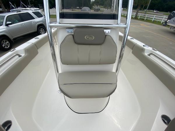 2024 Key West 203 FS boat interior with cushioned seating and stainless steel frame.